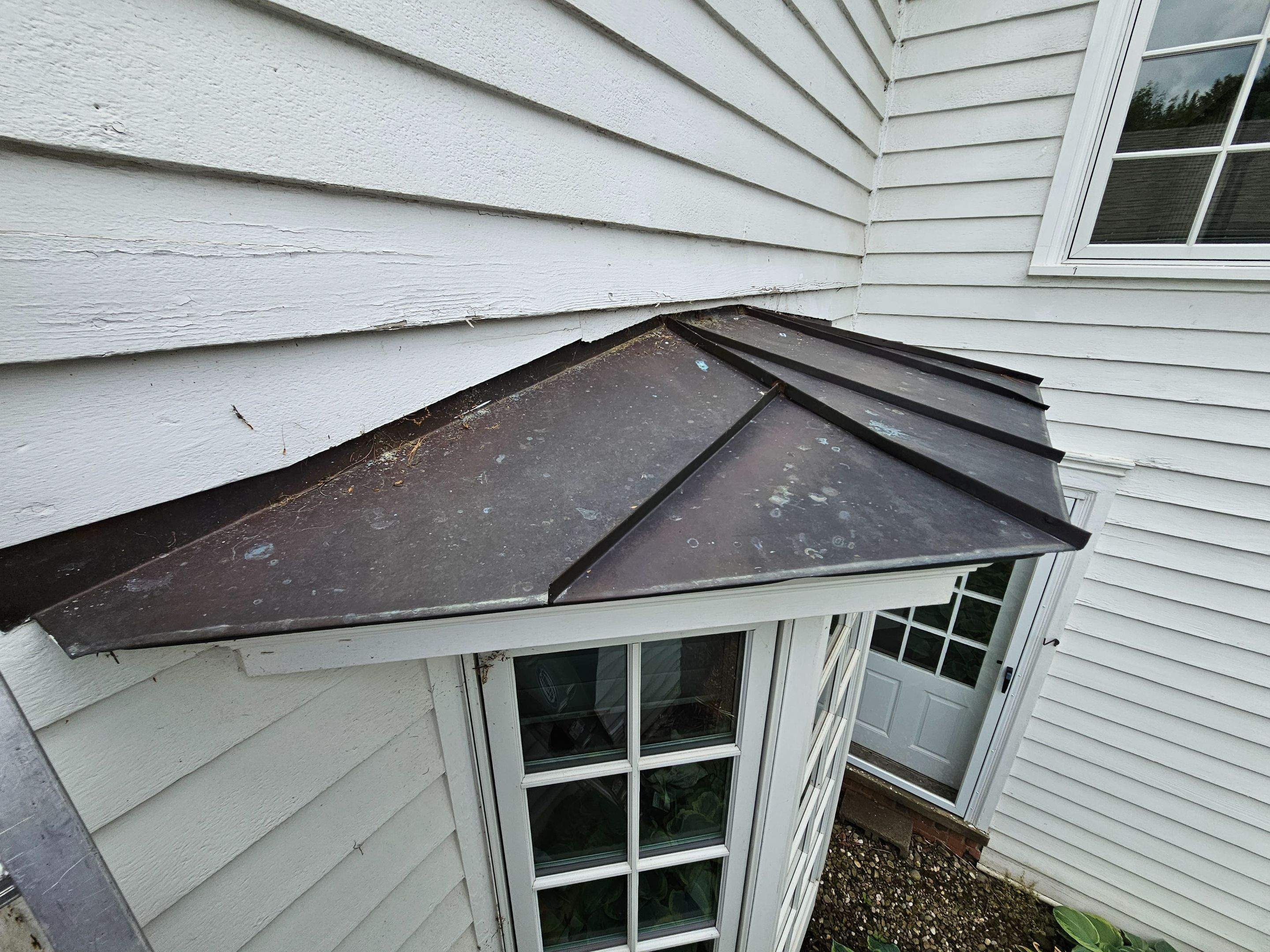 Copper Roof using Copper by Absolute Roofing and Construction