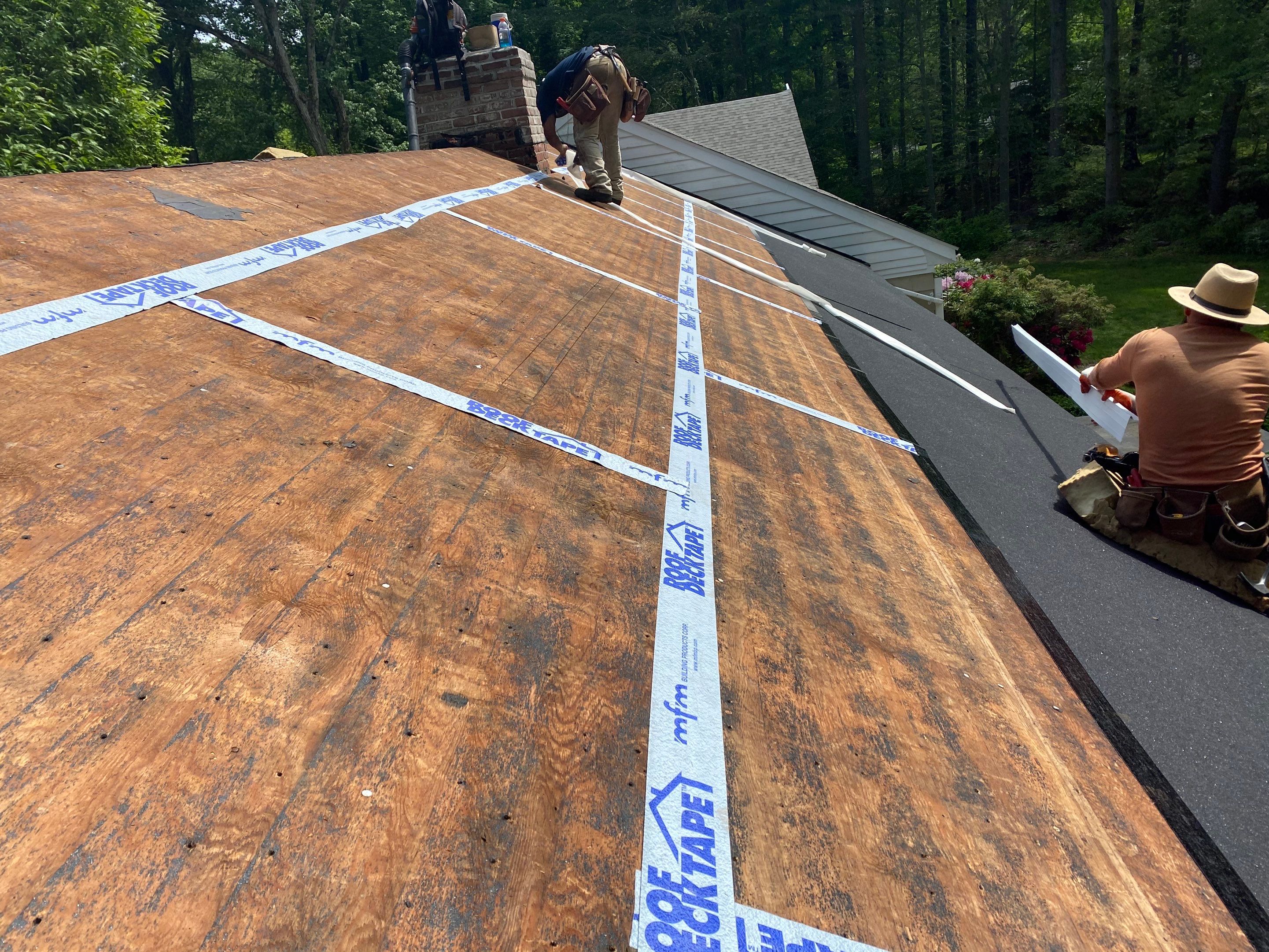 Commercial Roofing Installation using Owens Corning Duration Driftwood by A Plus Exterior