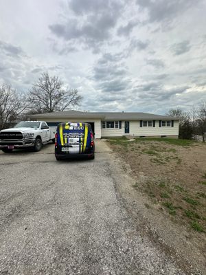 Indigo Board and Batten Siding and Window Replacement in Smithville