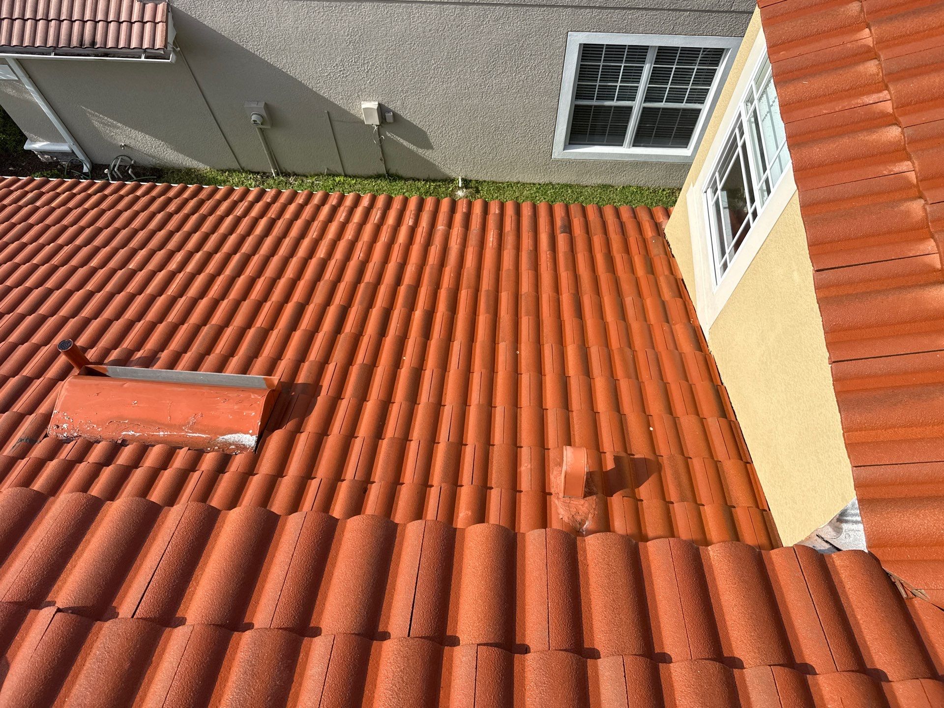 Soft Wash Tile Roof Cleaning in Sonoma Community, Sarasota, FL by Sunshine AquaWash