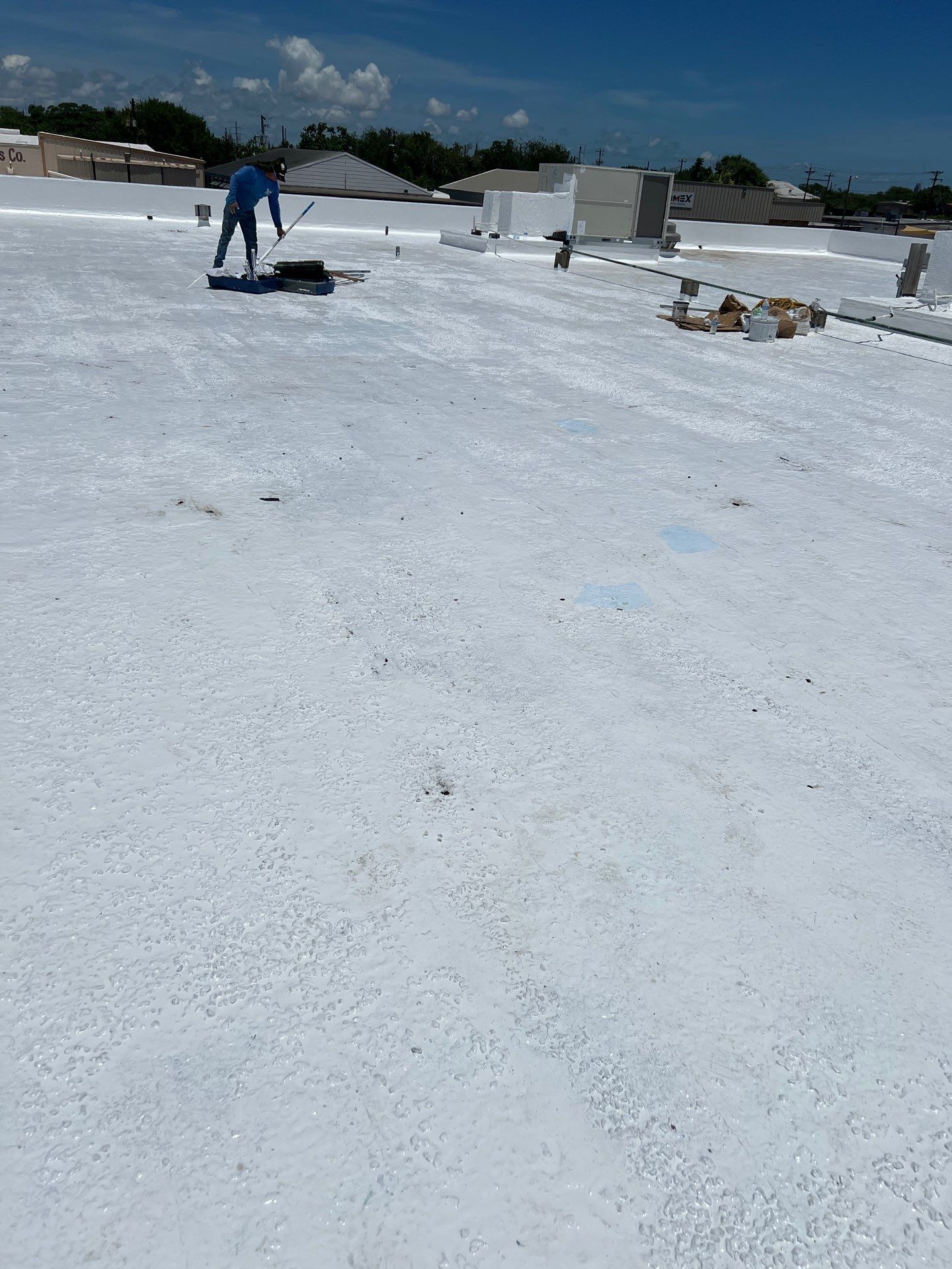 Dirty leaking Gravel Roof by Bayfront Roofing and Construction