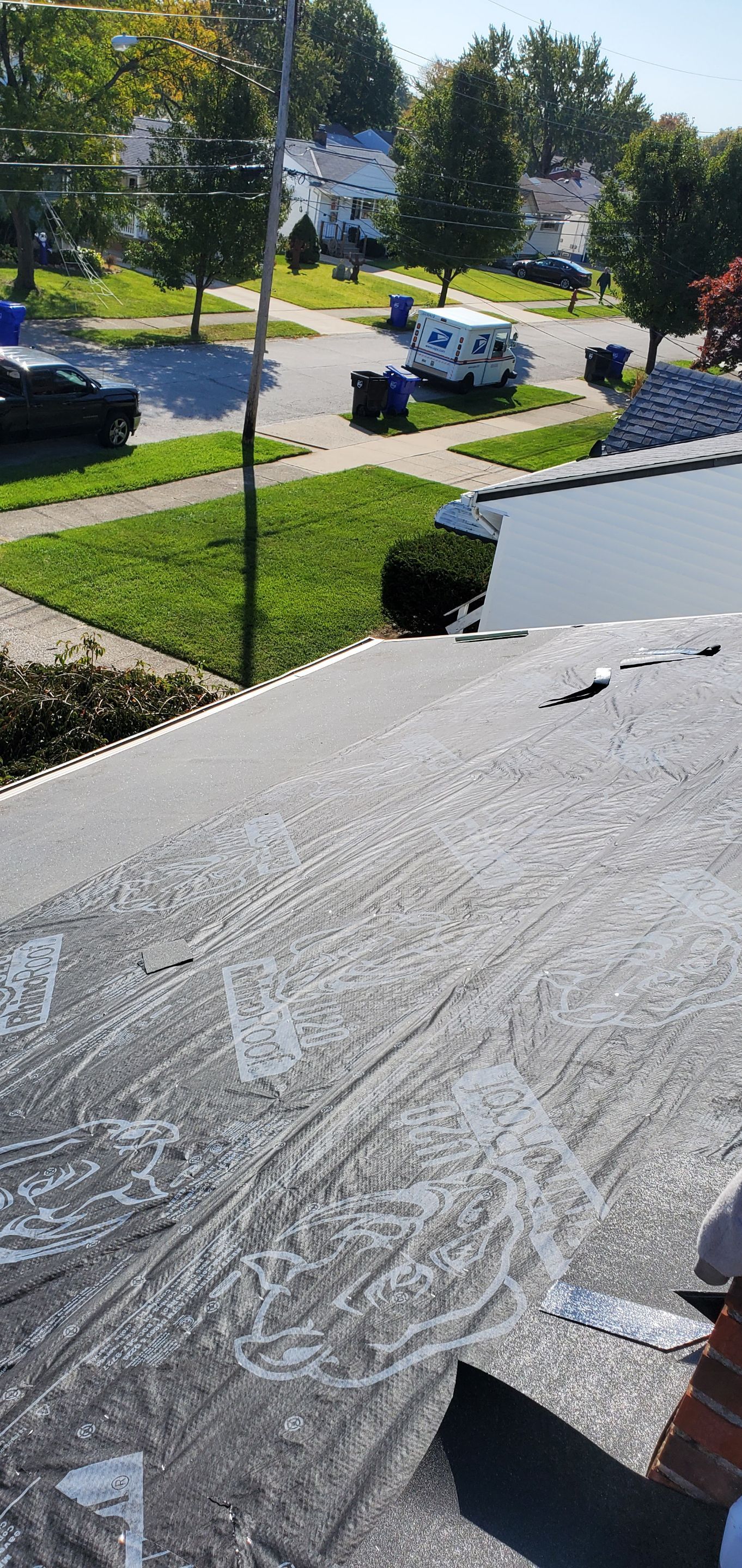 Residential Roofing Installation by Absolute Roofing and Construction