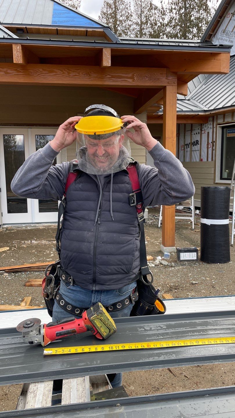 Residential Roofing Installation using 12" Prolok metal by Top Notch Roofing Inc