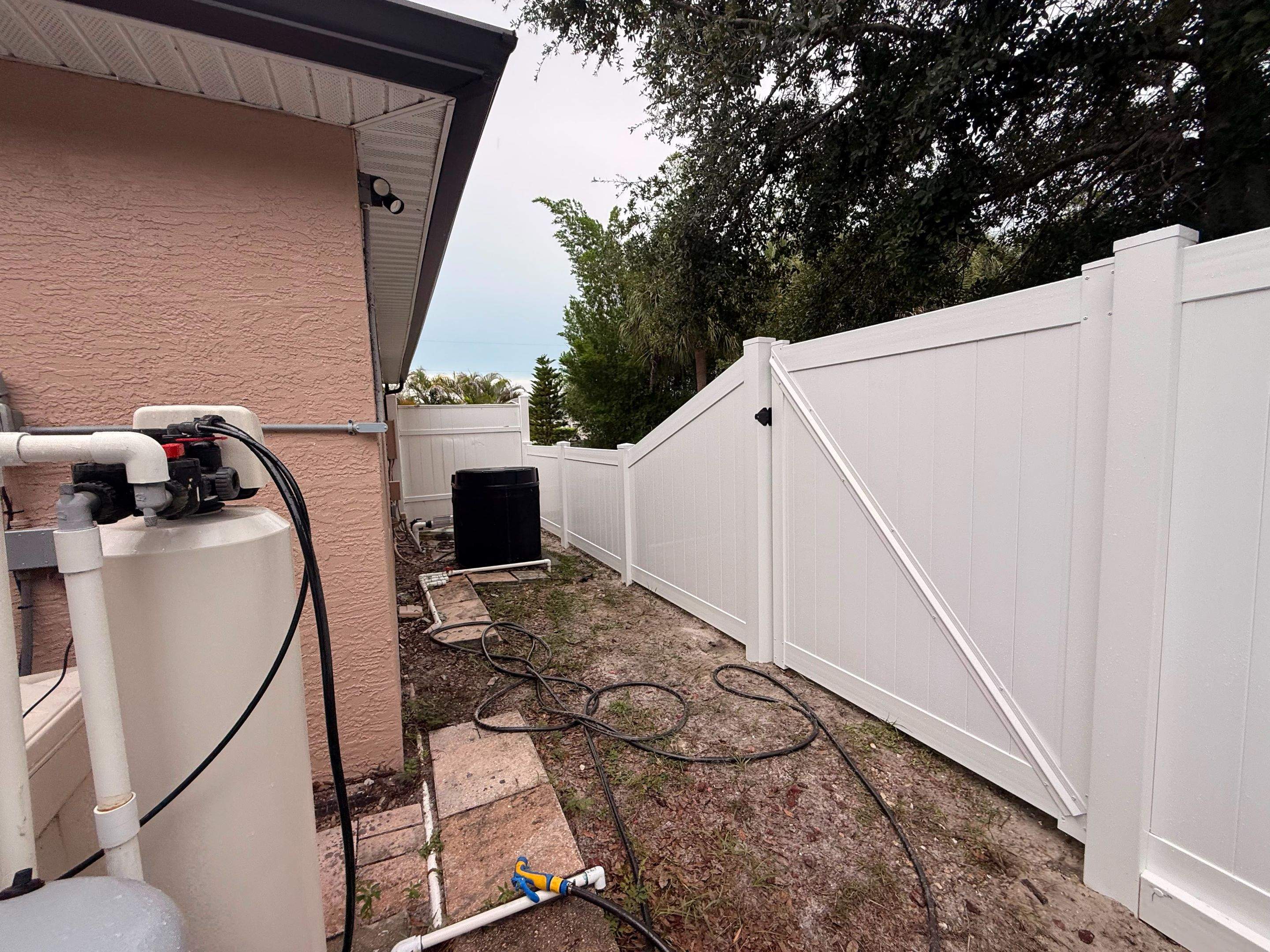 Vinyl Privacy Fence and Double Gate Installation in North Port by True Fence LLC