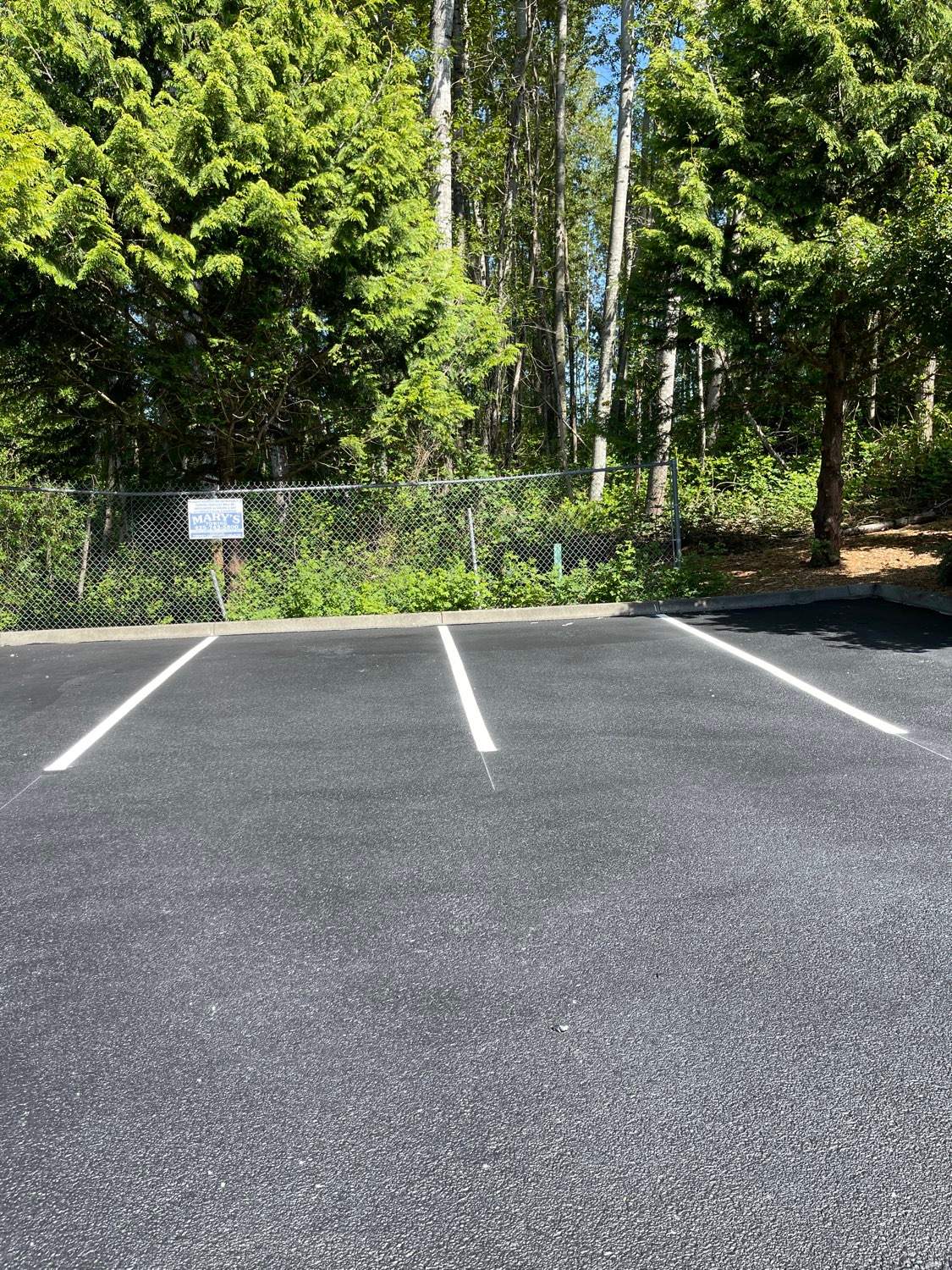 King Machine Business Parking Lot Sealcoat Overlay | Mukilteo by Jireh Asphalt & Concrete Inc 