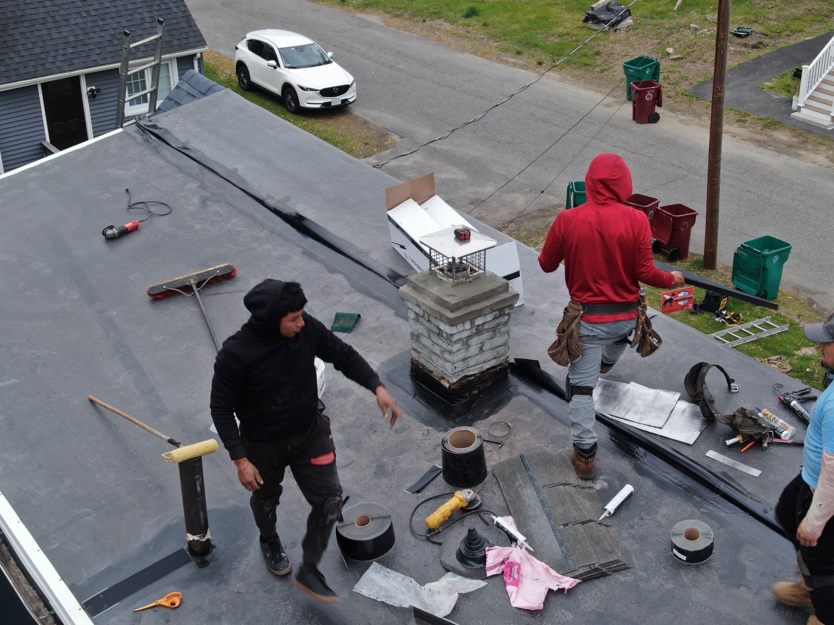 Roof and Flat Roof Membrane Replacement in Lowell, MA by Mighty Dog Roofing of Greater Middlesex County