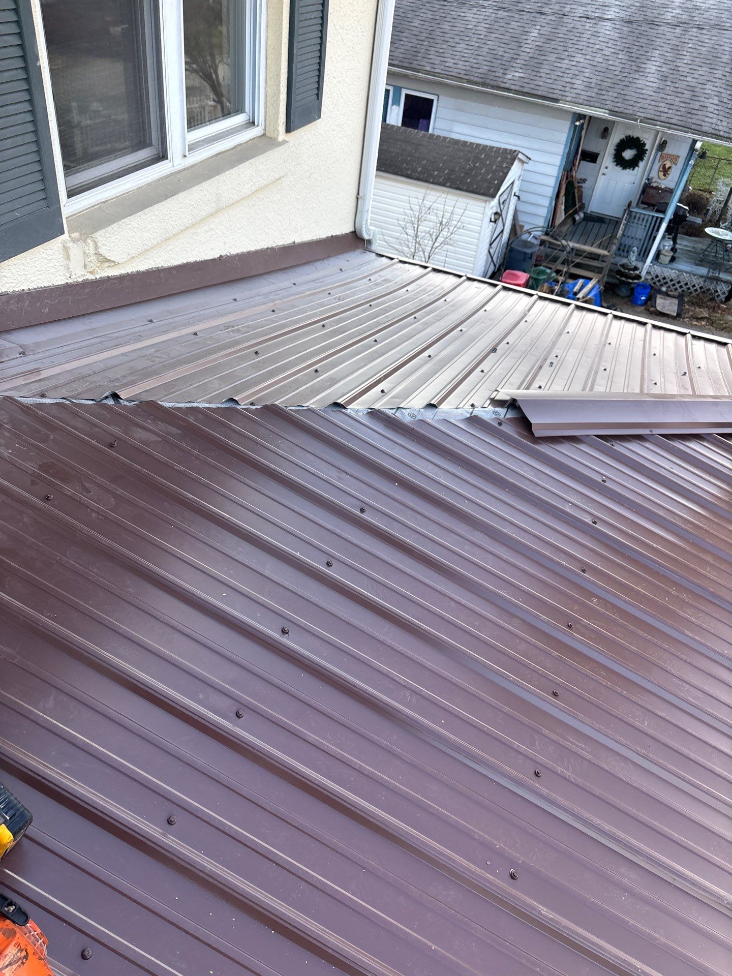 Residential Roofing Installation using Metal by Rainstoppers Roofing