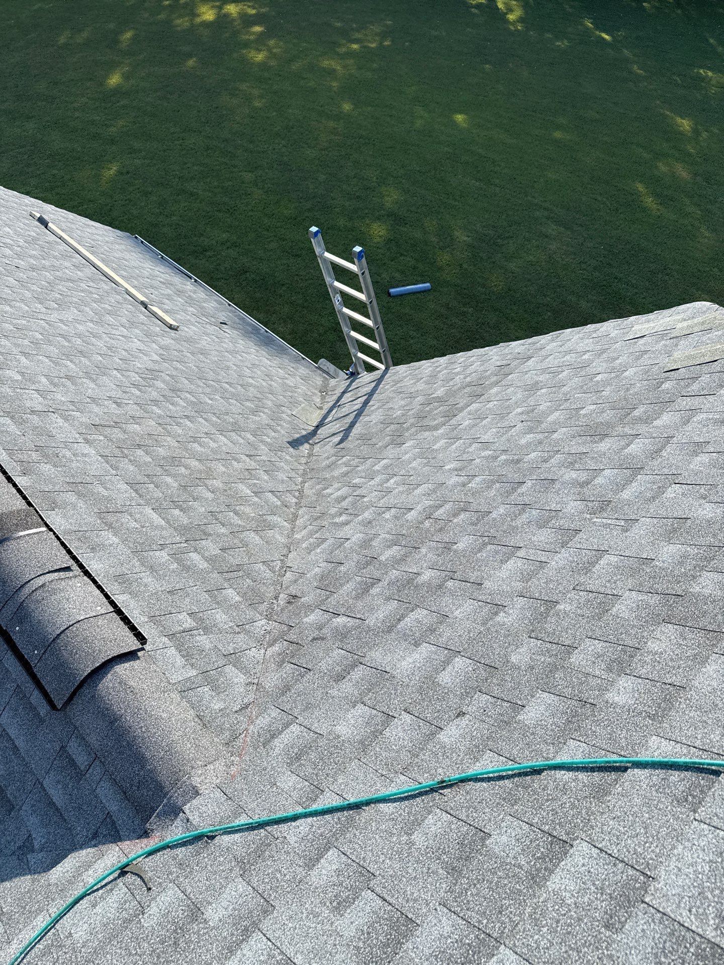 Residential Roofing Installation using GAF Timberline HDZ Oyster Grey by Rainstoppers Roofing