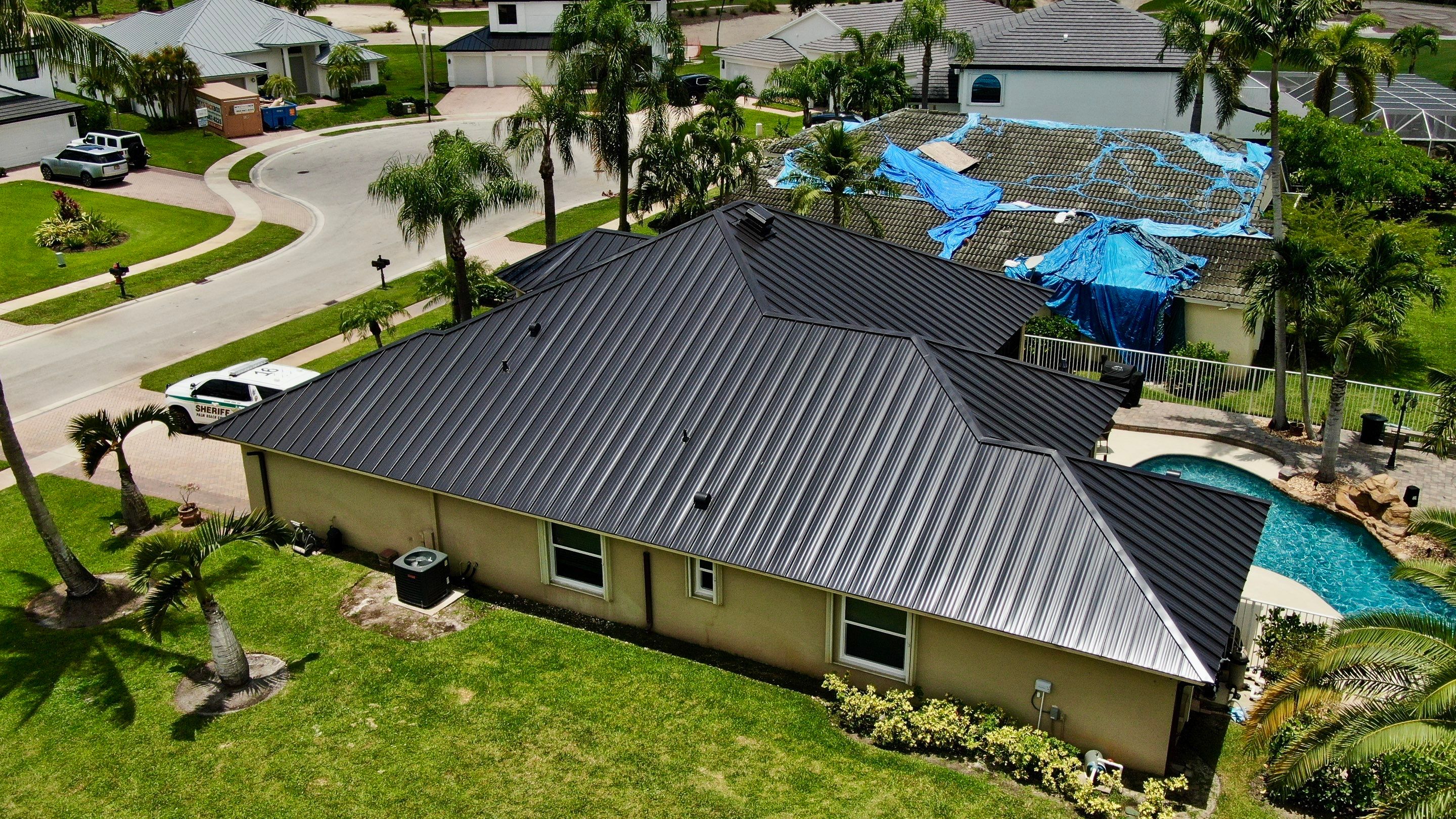 24ga 1.5" Mechanical Seam Matte Black by Total Roofing System The Metal Roof Experts