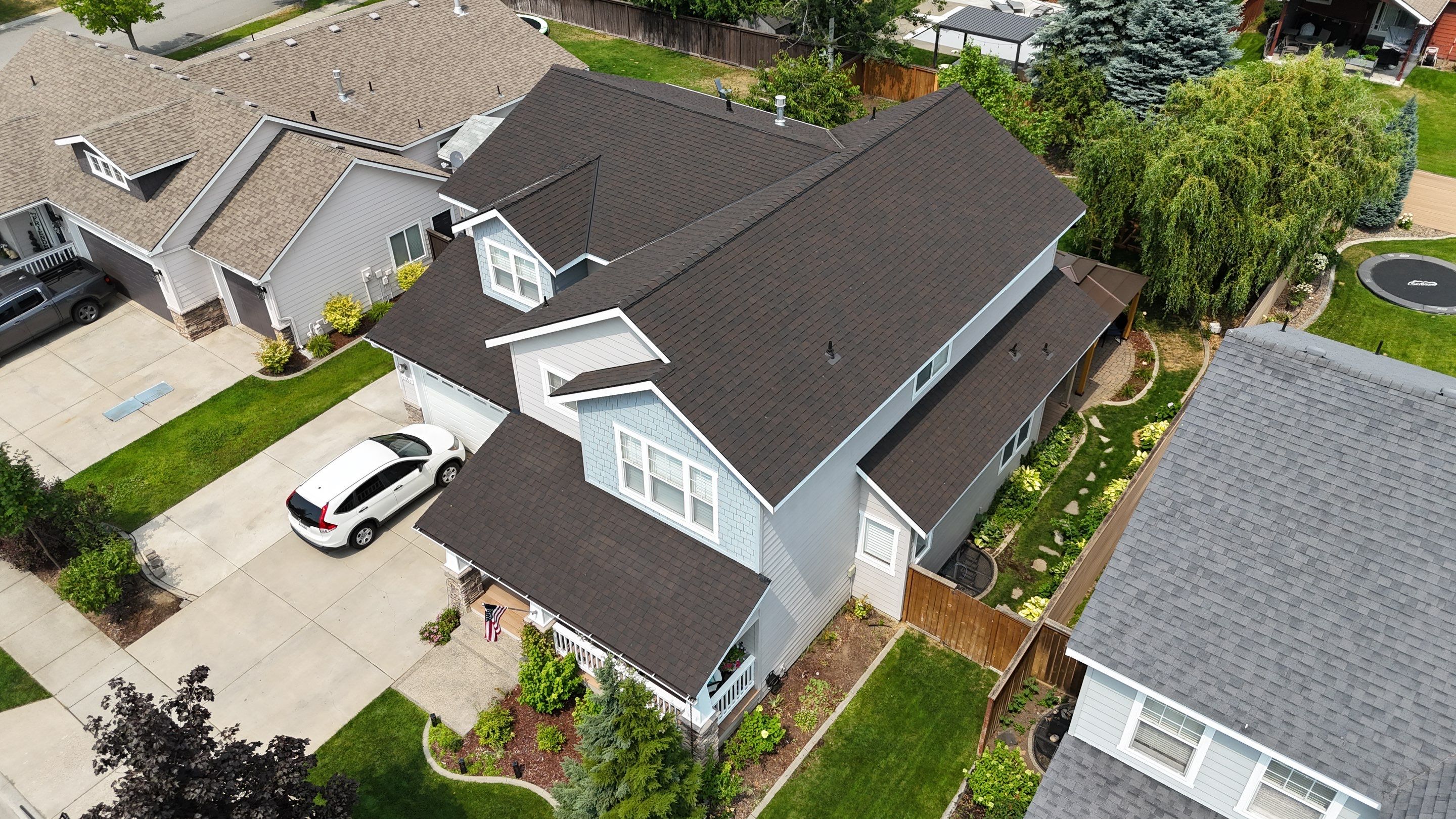 Alpine Roofing Enhances Marceille Court Homes in Coeur d'Alene, Idaho with CertainTeed Landmark TL Shingles - Max Def Black Walnut by Alpine Roofing