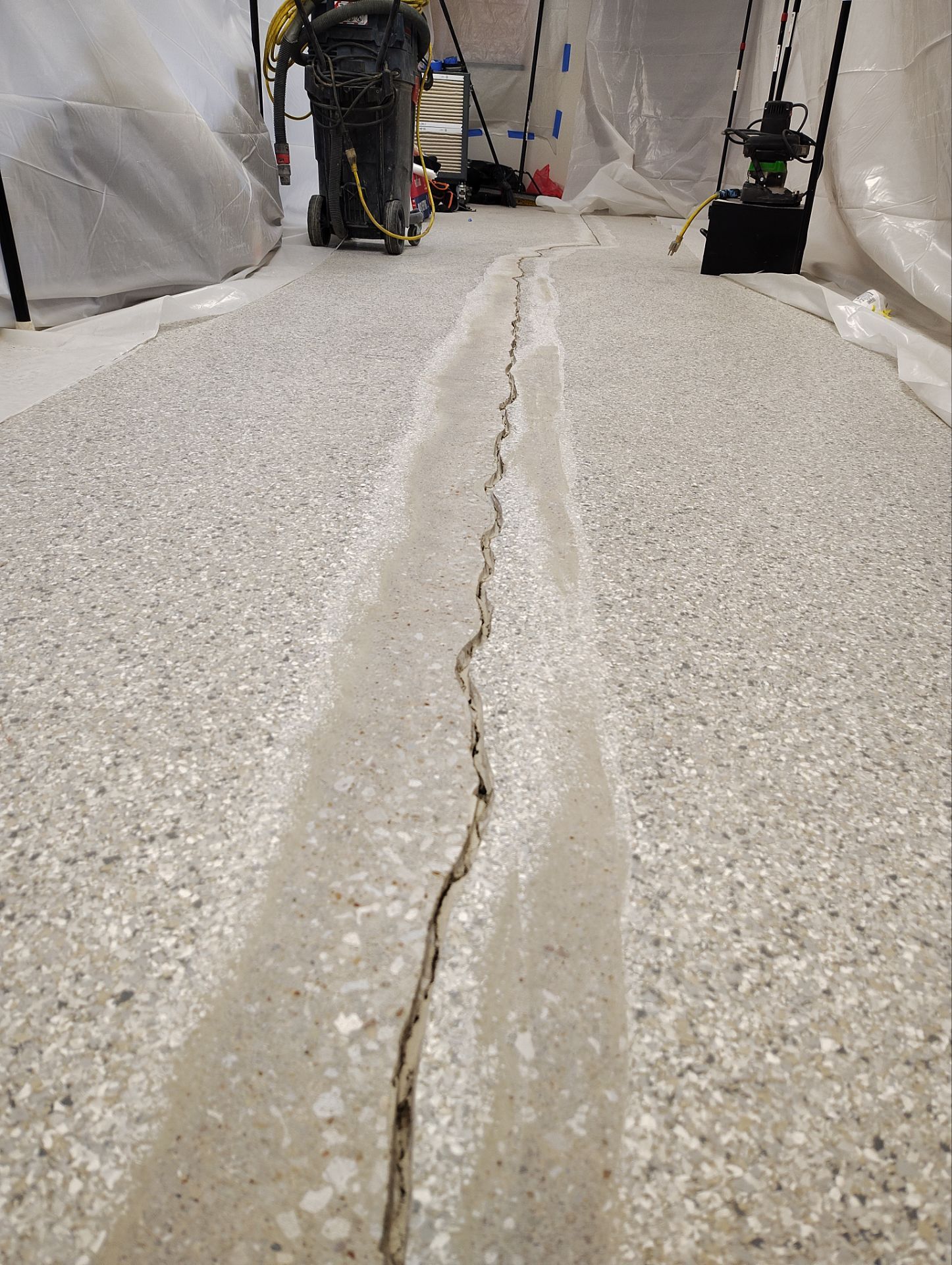 Medina Cracked basement floor with Epoxy by Beck Restoration Management Group