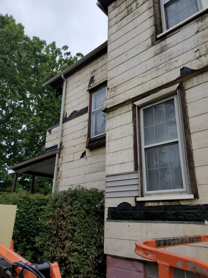 Fire damaged home in Tremont by Absolute Roofing and Construction