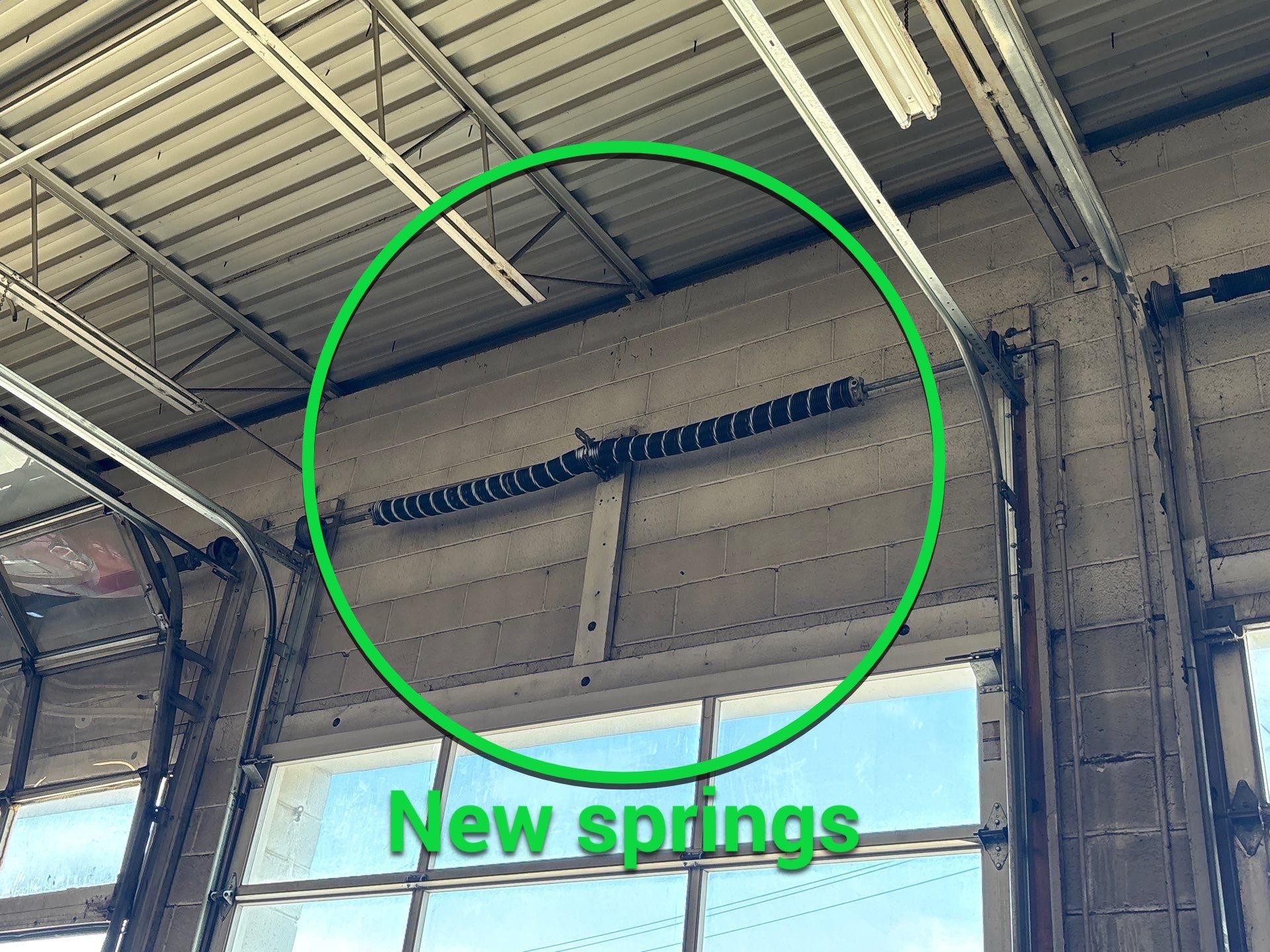 Commercial garage door repair for a local auto service shop in Warren, OH by Ohio Garage Door Repair