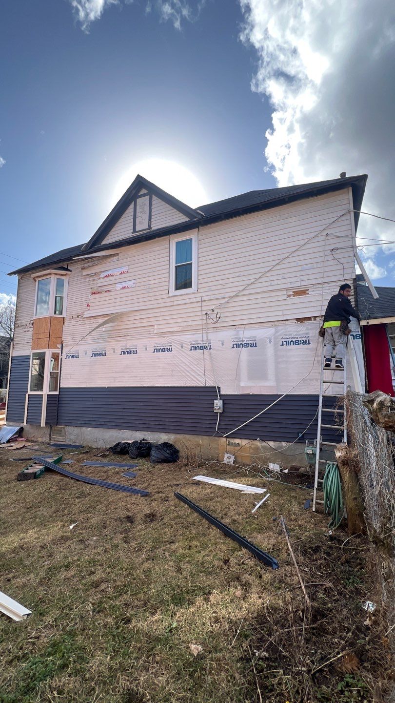 Adding Windows and installing Siding by Know-A-Guy Roofing & Exteriors