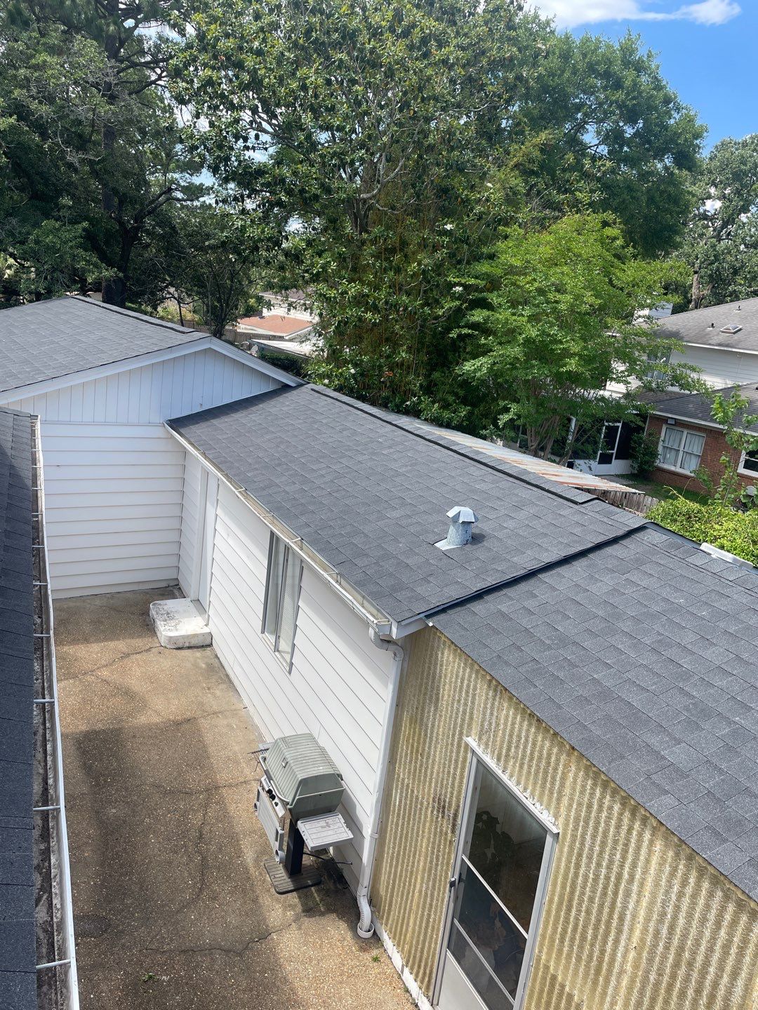 Residential Roofing Installation using Roof Replacement by American Roofing & Construction LLC