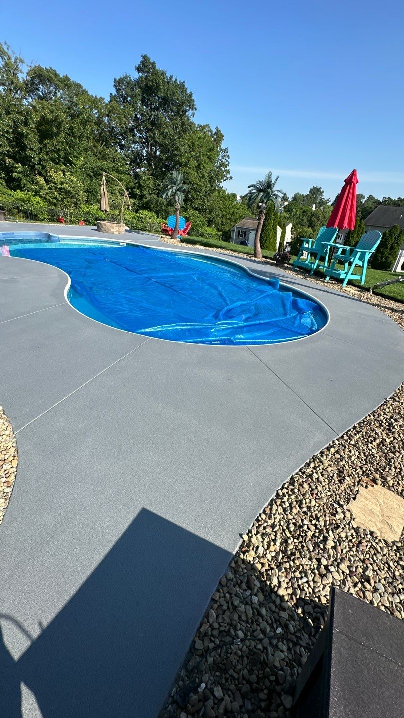 Twilight Pool Deck / Patio Project in Beaver falls by Floors in a Day, Inc