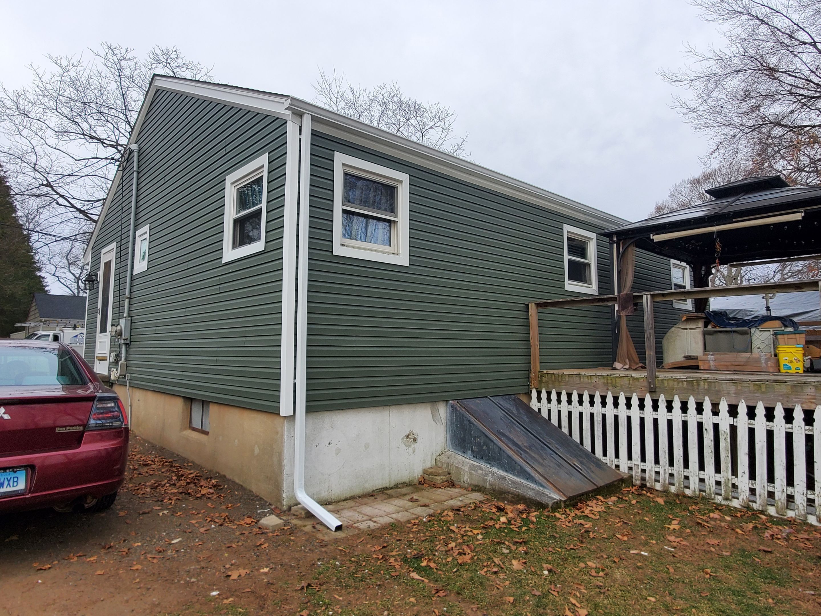 Siding Installation using Certainteed Mainstreet Forest Green by A Plus Exterior