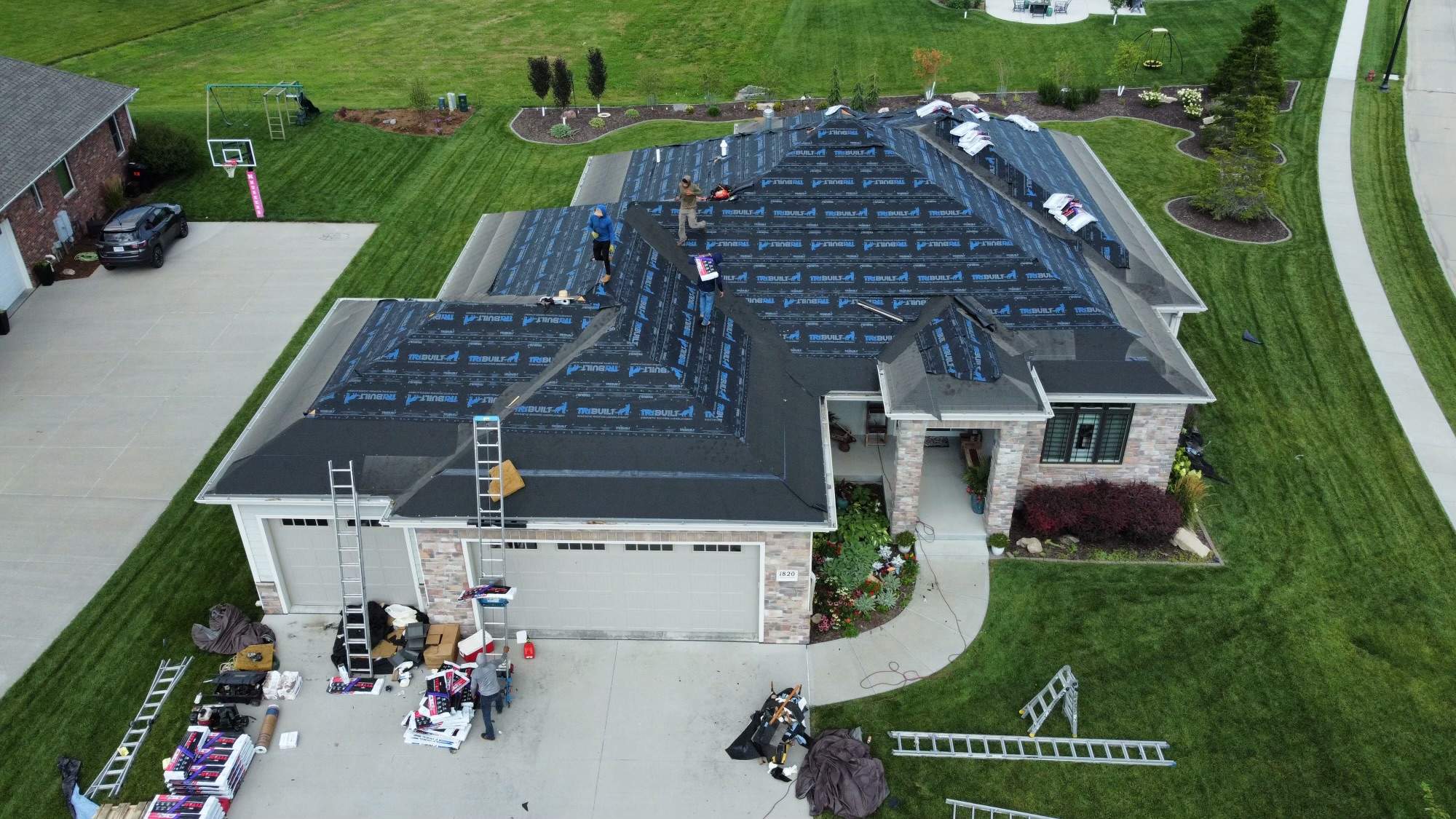 Residential Roofing Installation using TAMKO TITAN WEATHERED WOOD by Lightning Exteriors