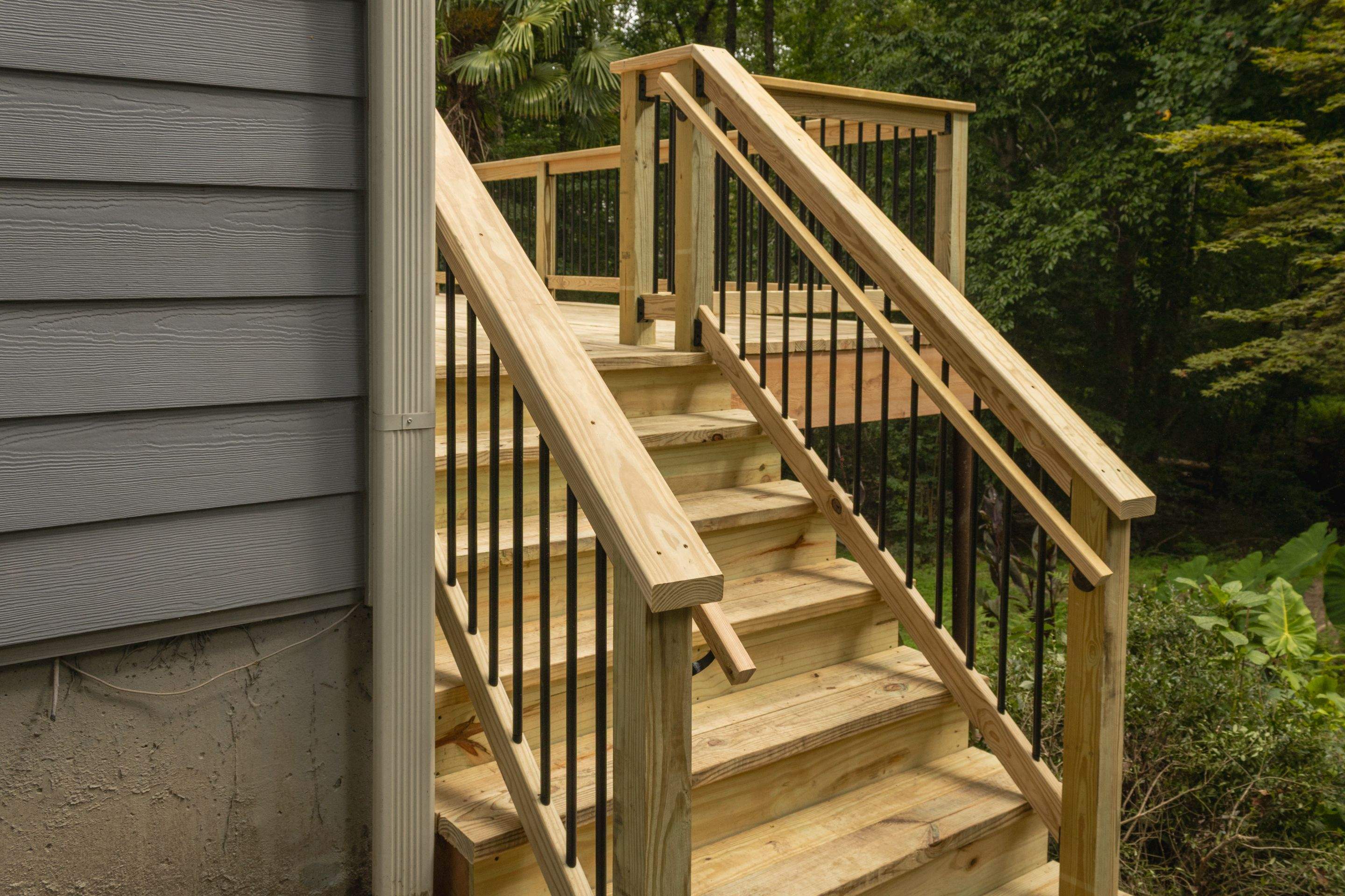 Gwinett County Wood Deck Resurface with Graspable Handrail by Nelson Exteriors 