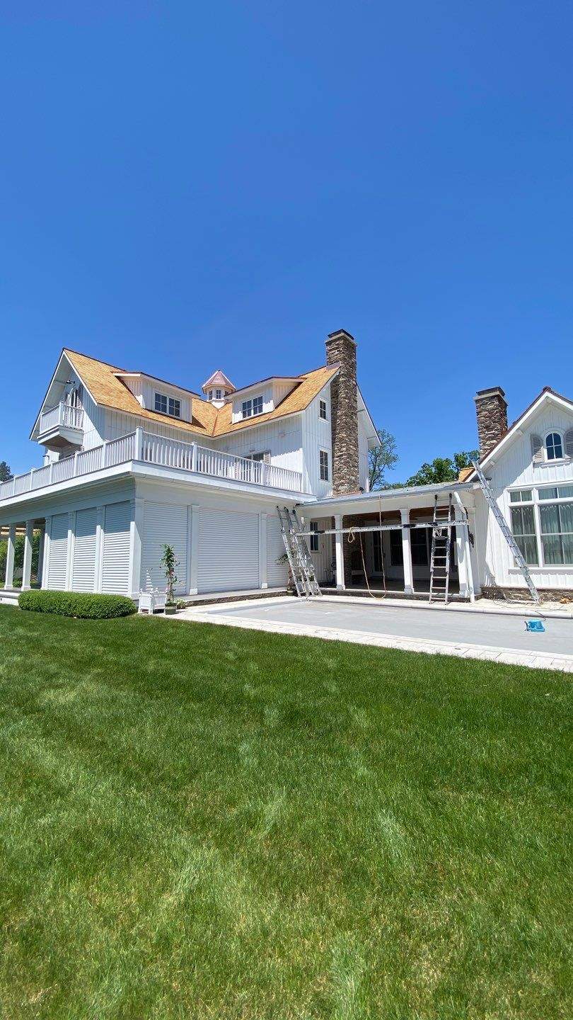 Cedar Shake Roof Replacement with Half Round Gutter Installation by Custom Installations