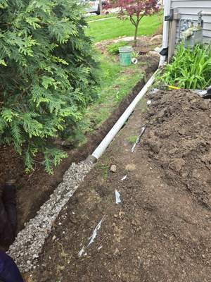 Downspout Discharge Installation & Yard Regrading