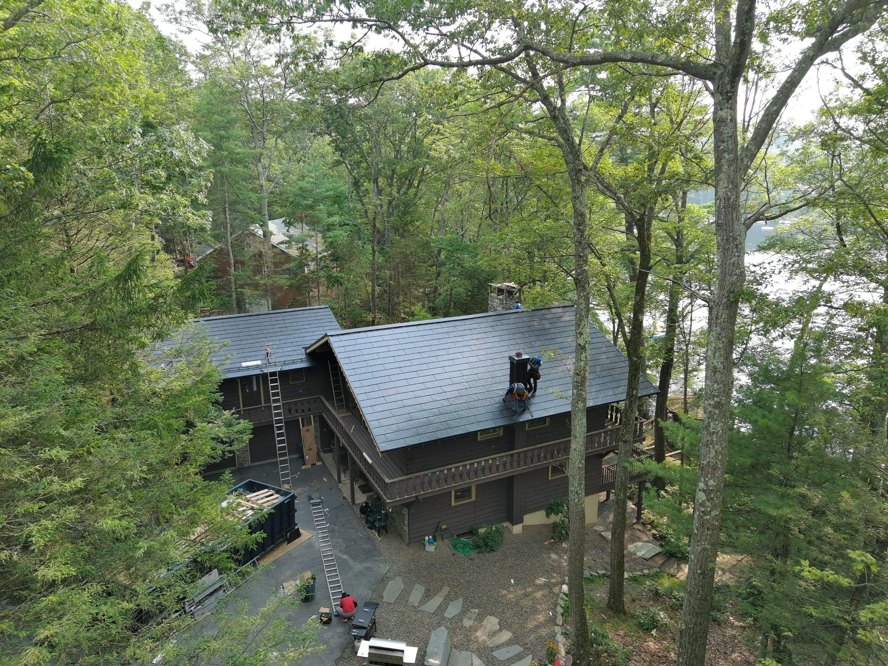 Stunning Tesla Solar Roof Cabin in the Woods by American Home Contractors