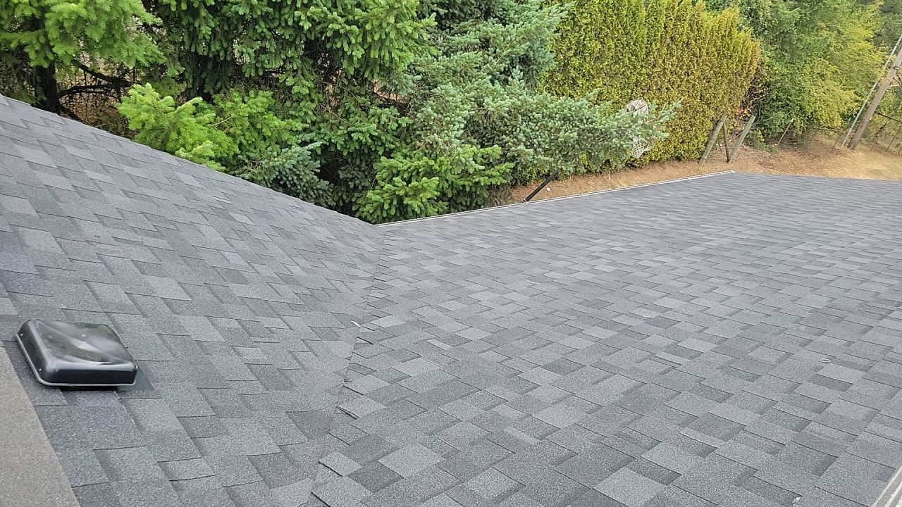 Residential Roofing Installation using IKO Dynasty (Color: Granite Black) by Orezona Building & Roofing Company, Inc.