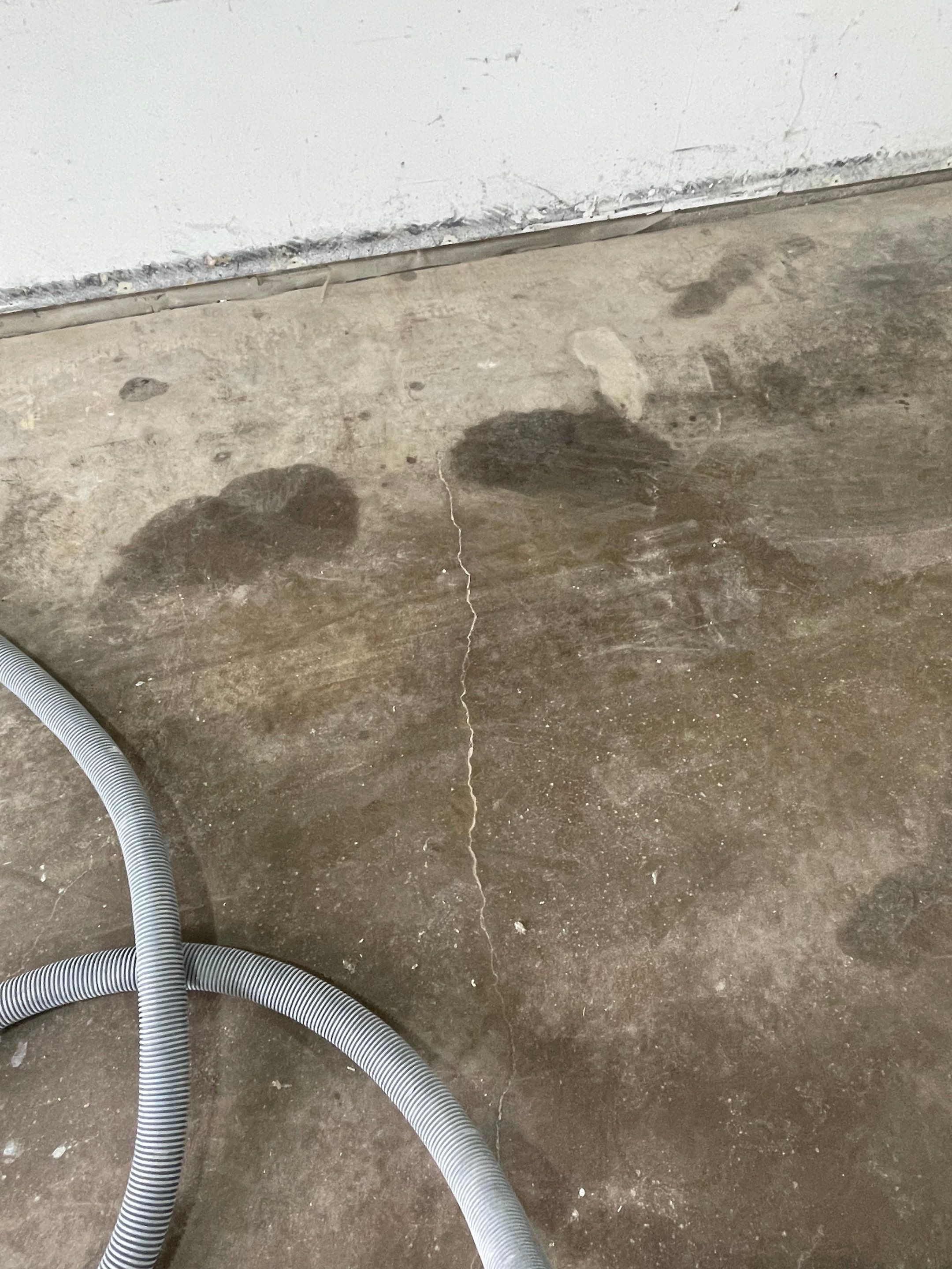 Coyote Flake Concrete Coating for Sioux Falls Garage by Select Painting, Coatings & Garage Cabinets