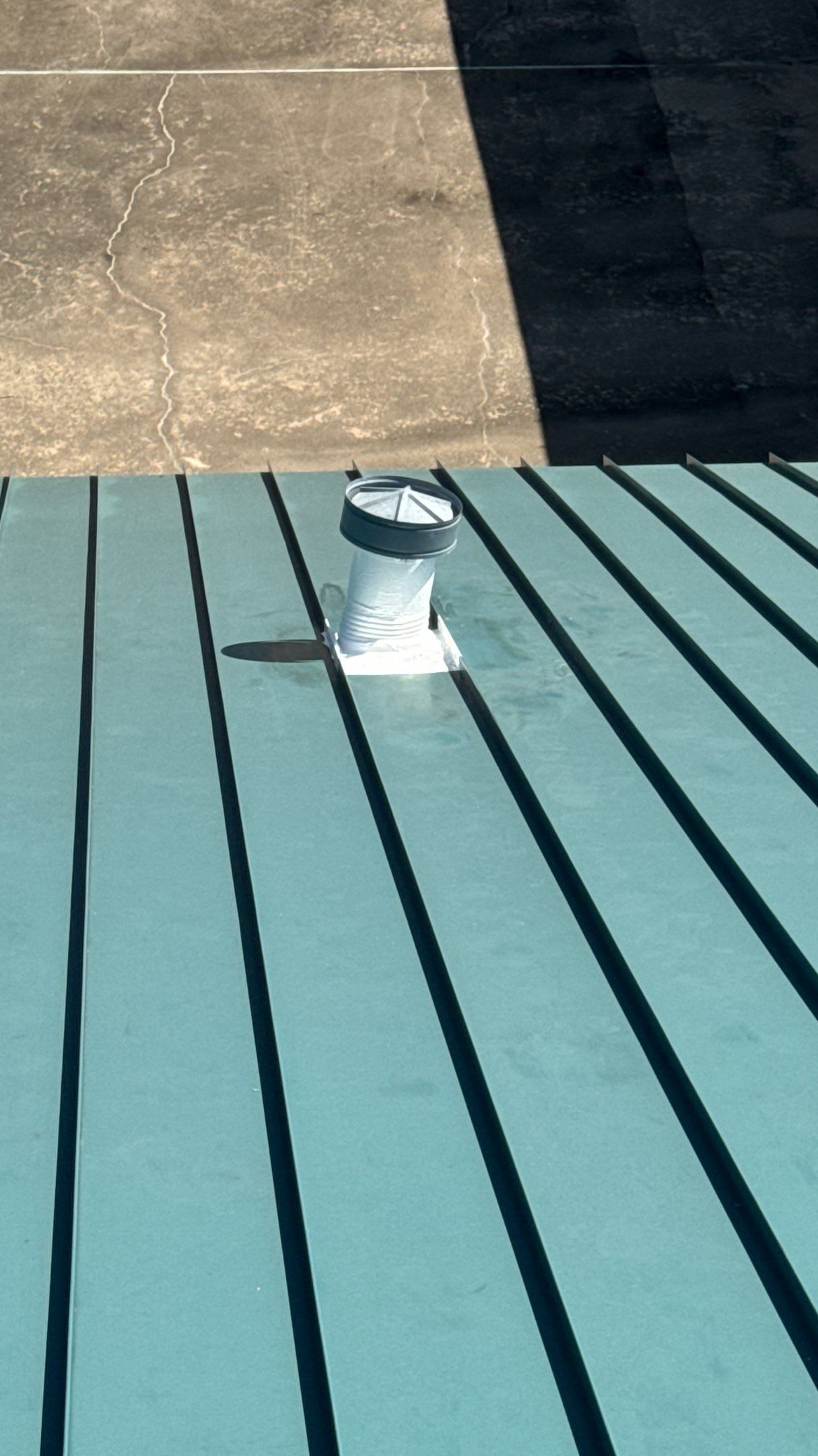 Commercial Roofing Repair using TRP #924 Eterna-Sil Premium Silicone Roof Coating by Harvey Roofing & Construction