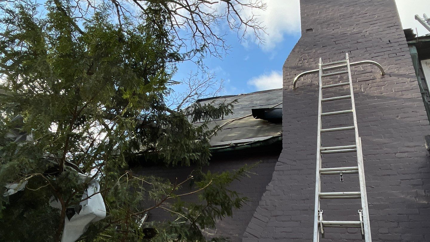 Slate Roof Removal using Atlas Storm Master Slate by Total Exteriors