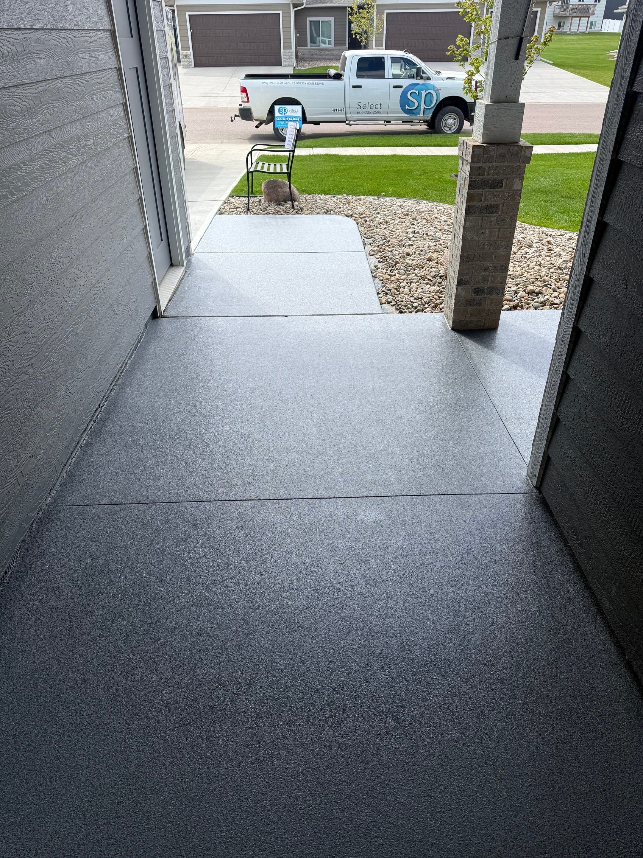 Decorative Flake Concrete Coating for Sioux Falls Porch and Patio by Select Painting, Coatings & Garage Cabinets