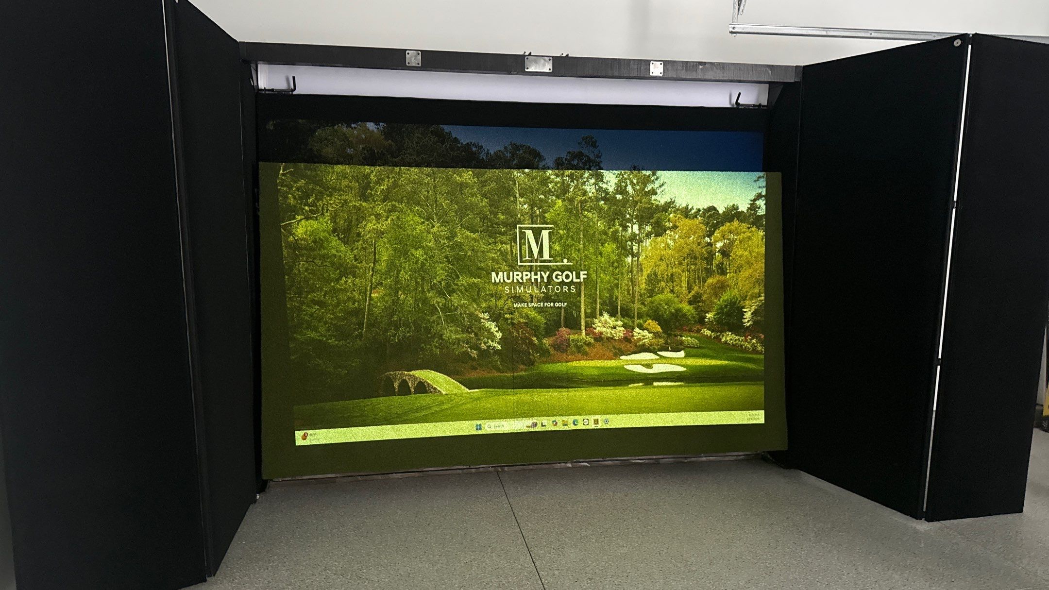 Ben Took It To The Next Level With a Golf Simulator by Banner Garage