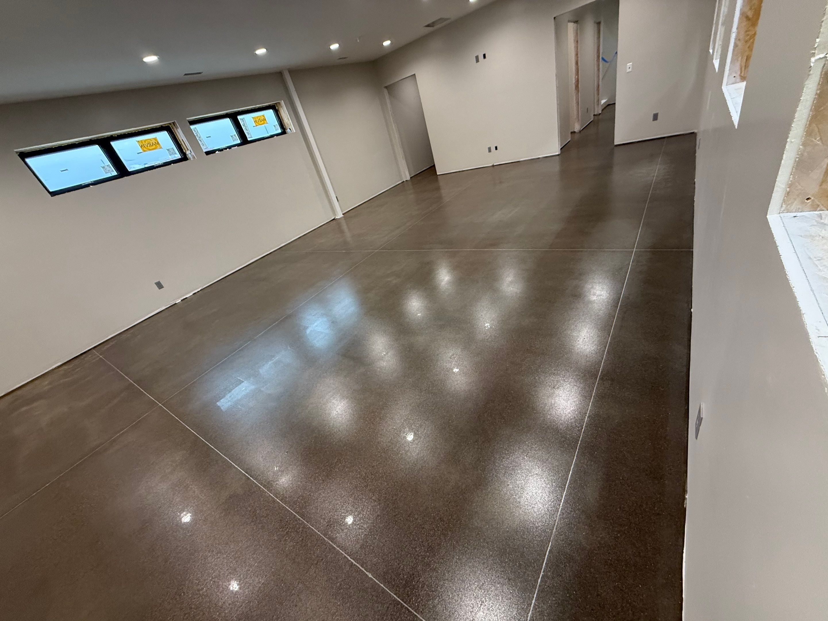 Industrial Concrete Polishing and Coating for Large Manufacturing Warehouse by Select Painting, Coatings & Garage Cabinets