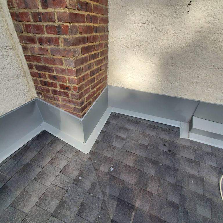 New Roof & Gutters by Island Roofing Inc.