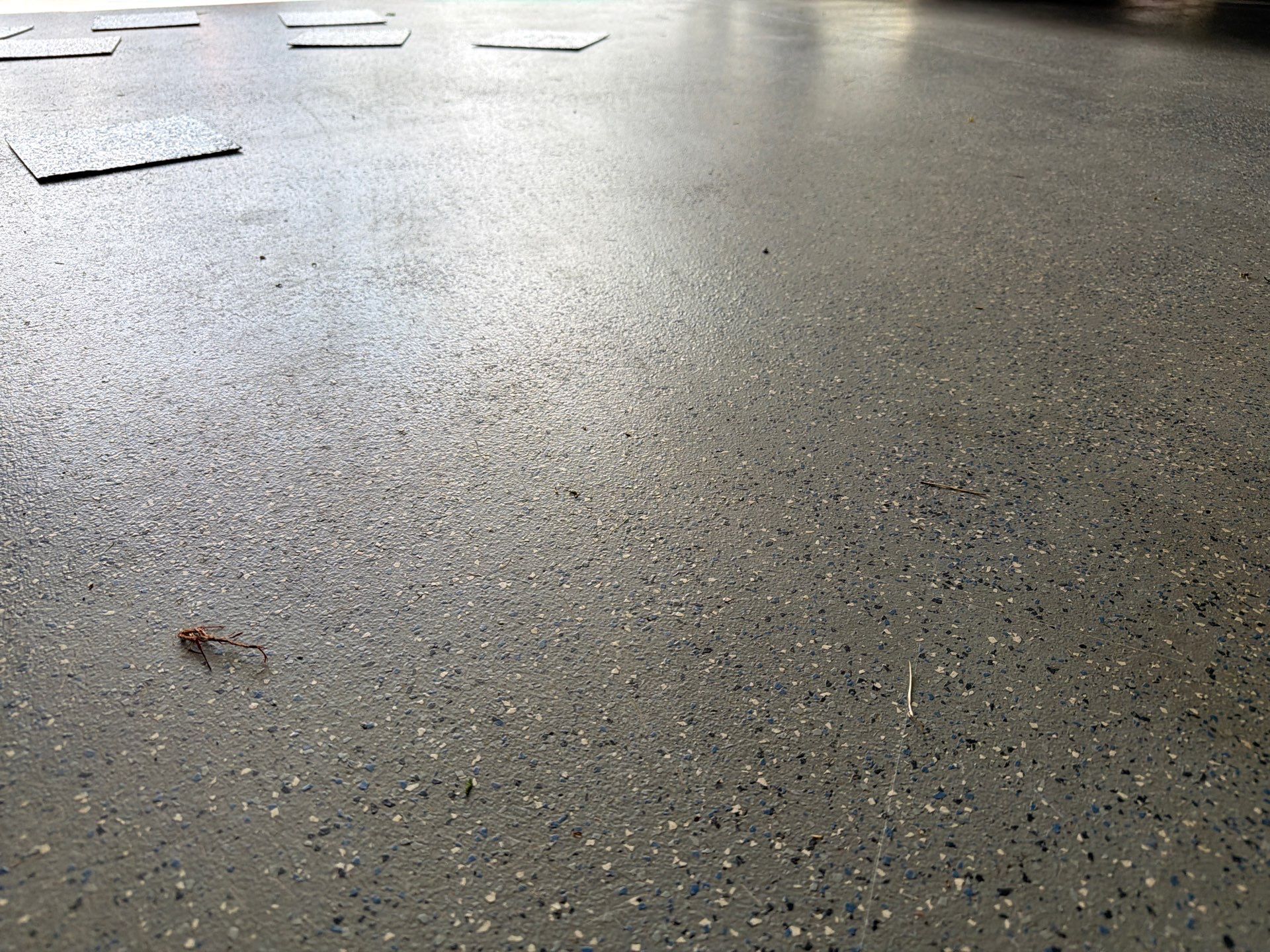 Residential Garage Floor Coating in Sioux Falls by Select Painting, Coatings & Garage Cabinets