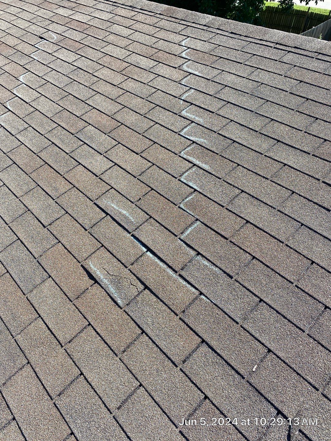 Roof inspection in Bartlesville by Decor Roofing & Restoration