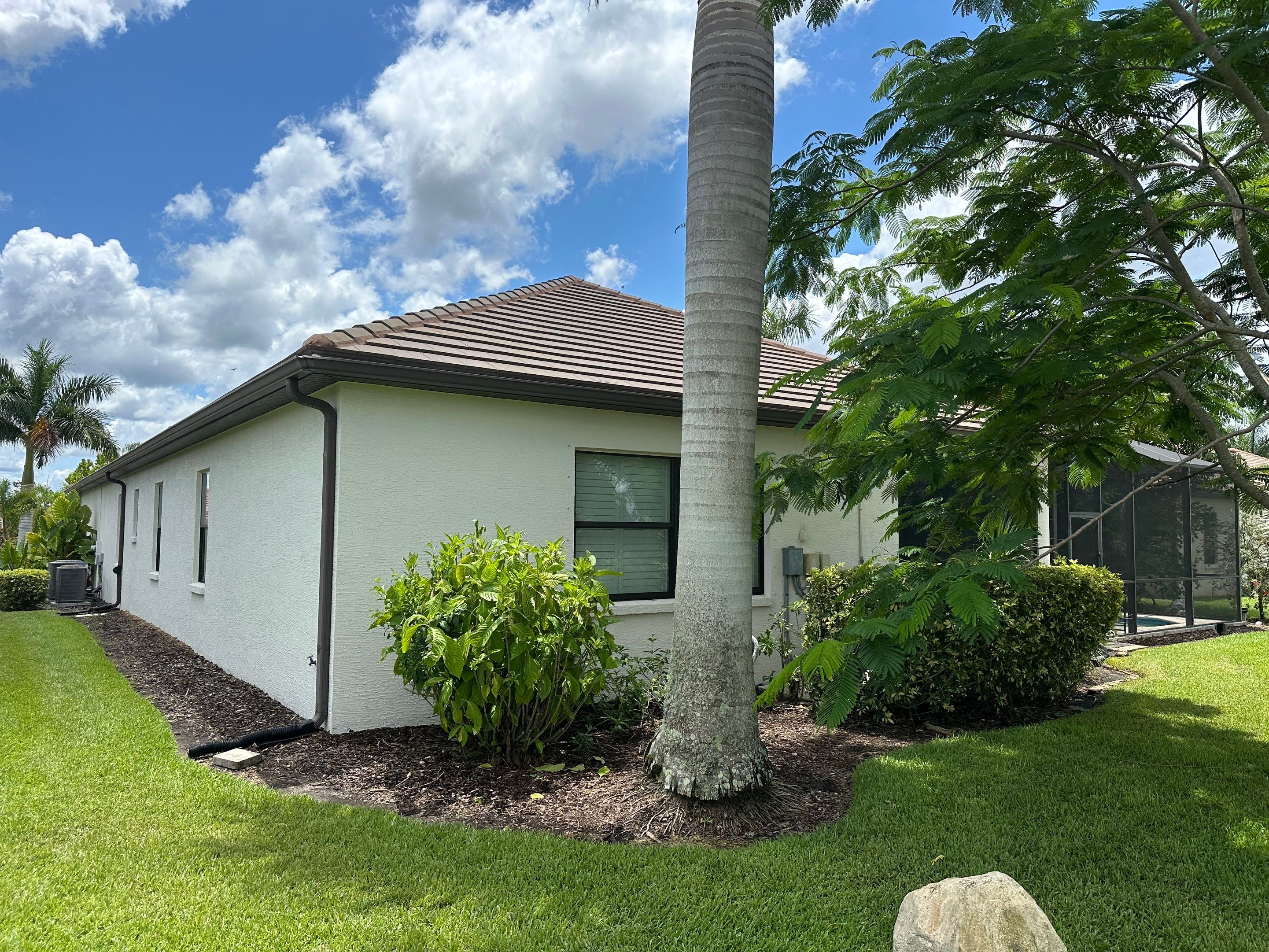 Flat Tile Roof Cleaning, House Wash & Sidewalk Cleaning in Enclave at Country Meadows, Bradenton, FL | Sunshine AquaWash by Sunshine AquaWash