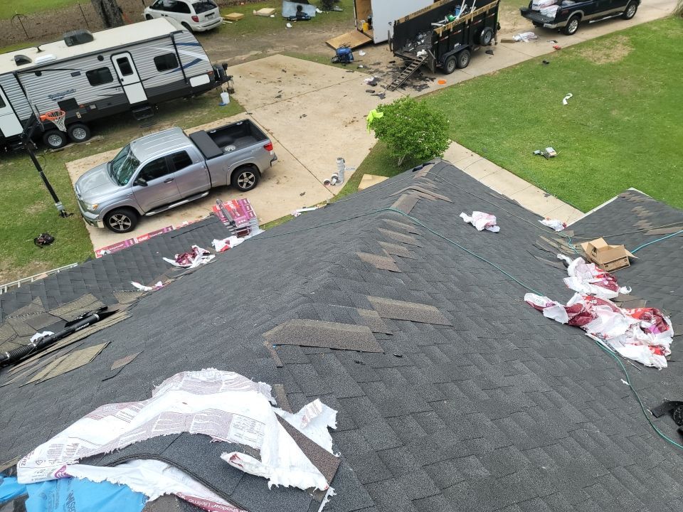 Residential Roofing Installation using Roof Replacement by American Roofing & Construction LLC