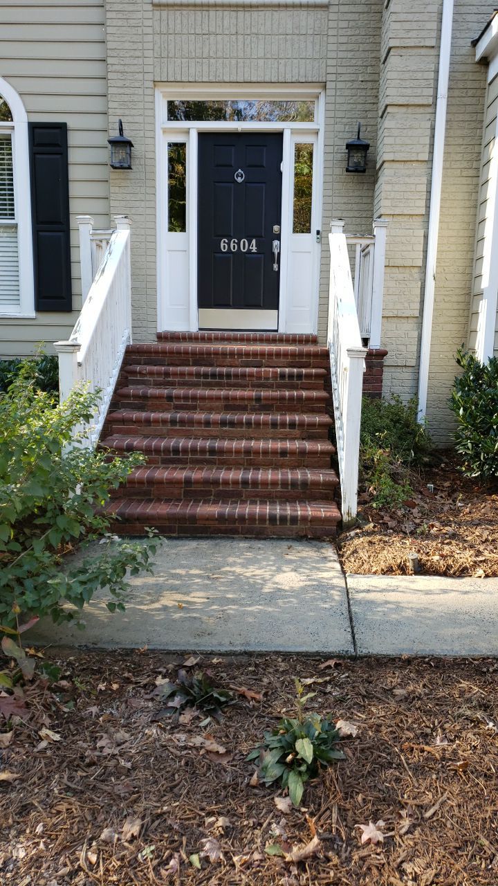 Driveway Clean using cleaner by Power Wash Masters LLC