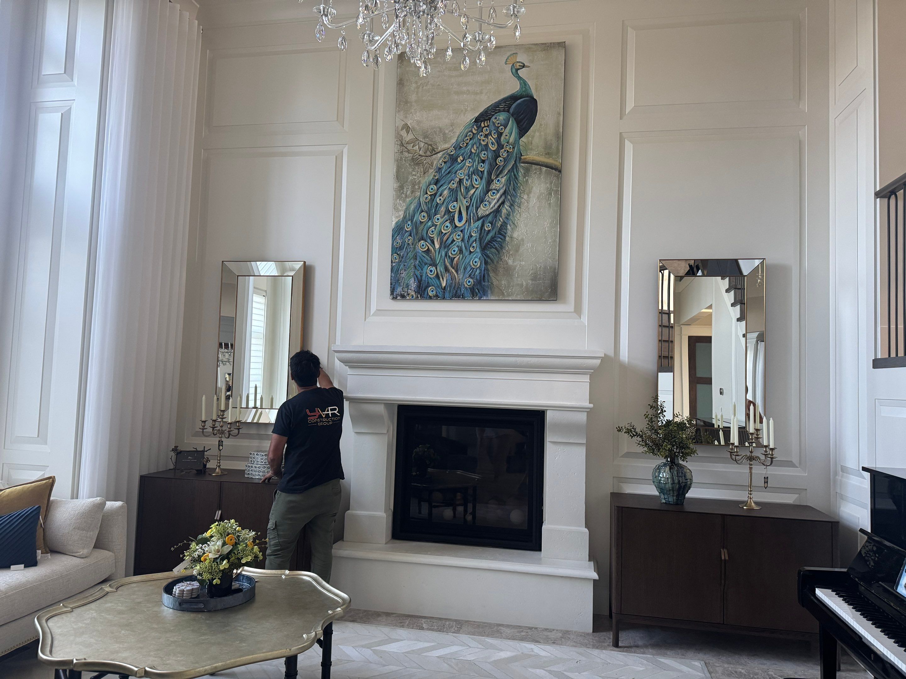 Professional Hanging of Mirrors & Art in a Designer Home by YVR Construction Group