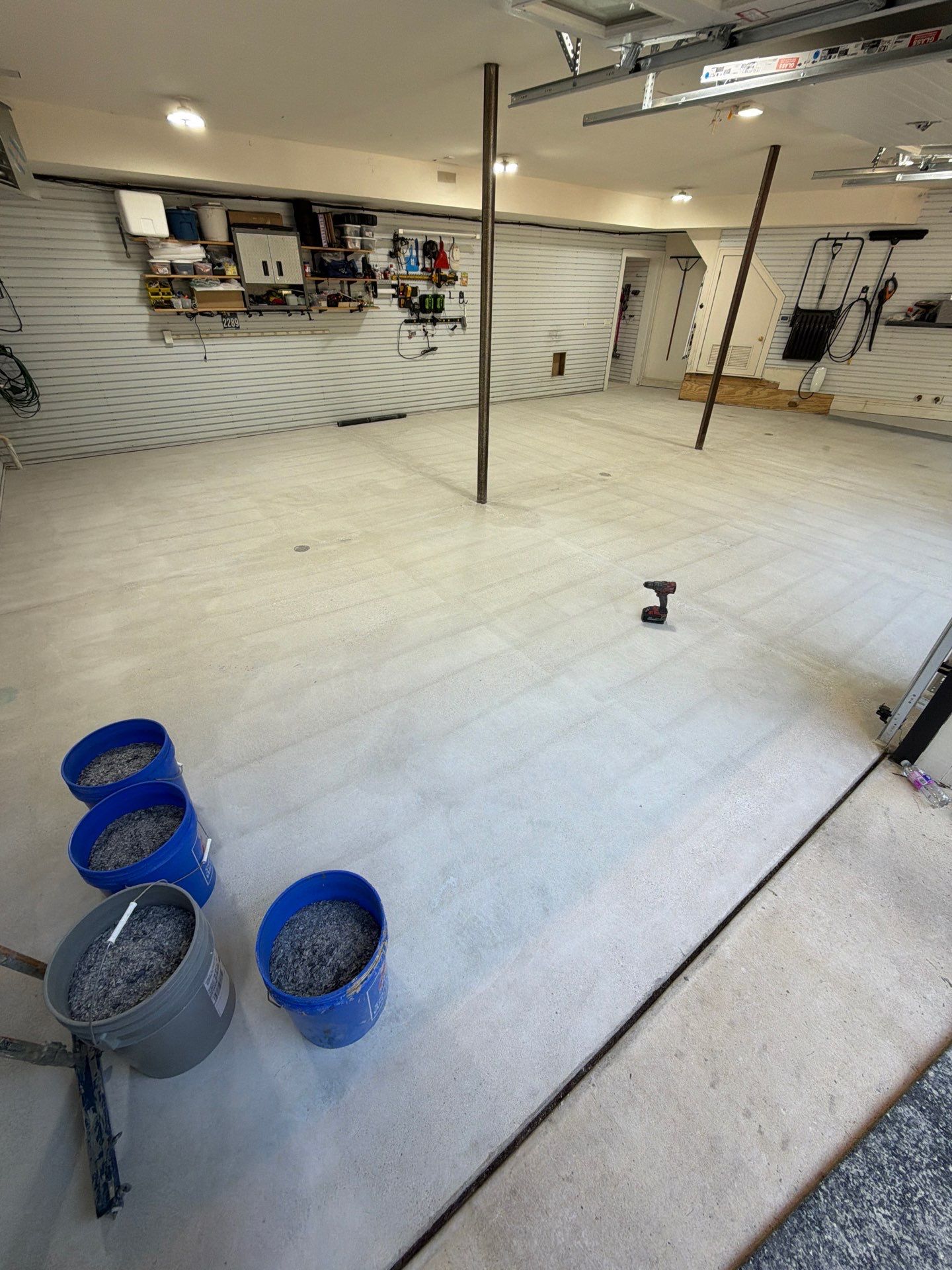Residential Garage Epoxy Flake Floor Installation in Grand Haven by Gordon Painting