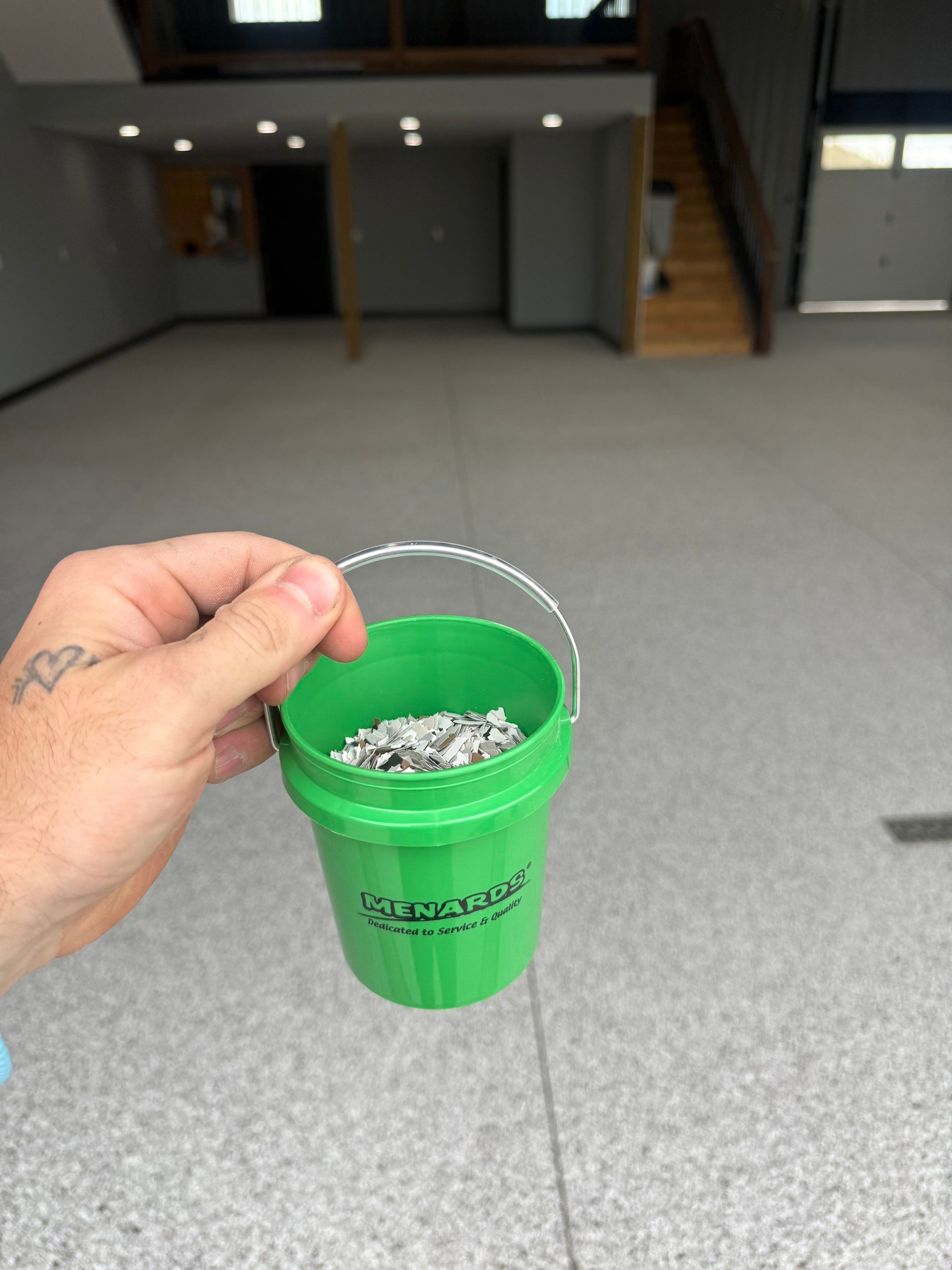 Polyaspartic Garage Floor Coating with Decorative Flake in Wentworth by Select Painting, Coatings & Garage Cabinets