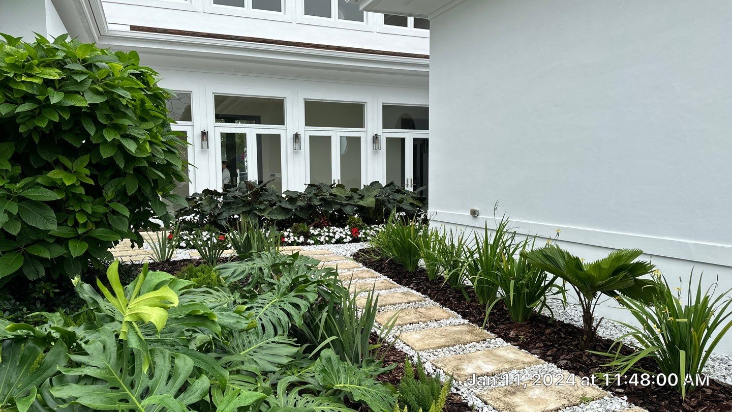 Backyard Landscape Renovation by Nature's Dream Landscape and Tree Service