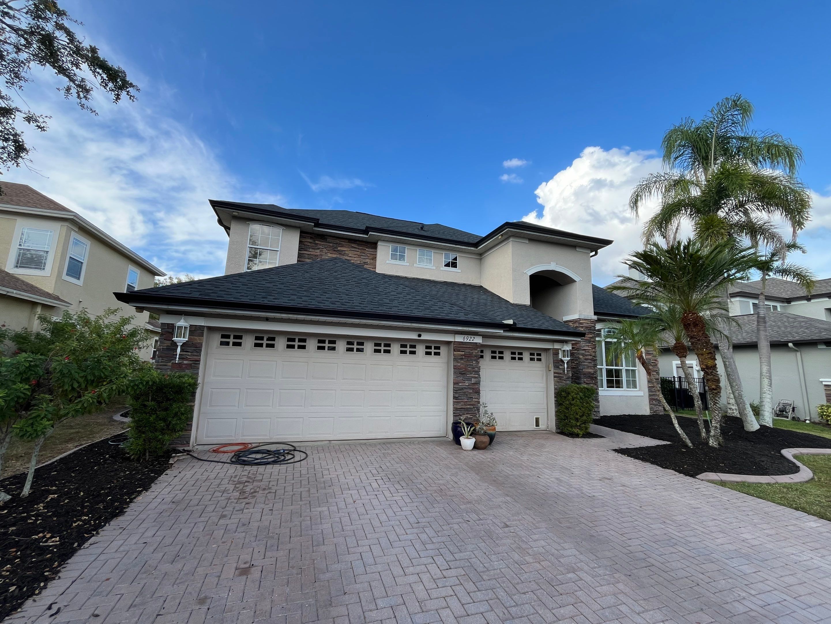 Black 6-inch Seamless Gutters for Modern Ellenton Homes FL by Gutter Professors