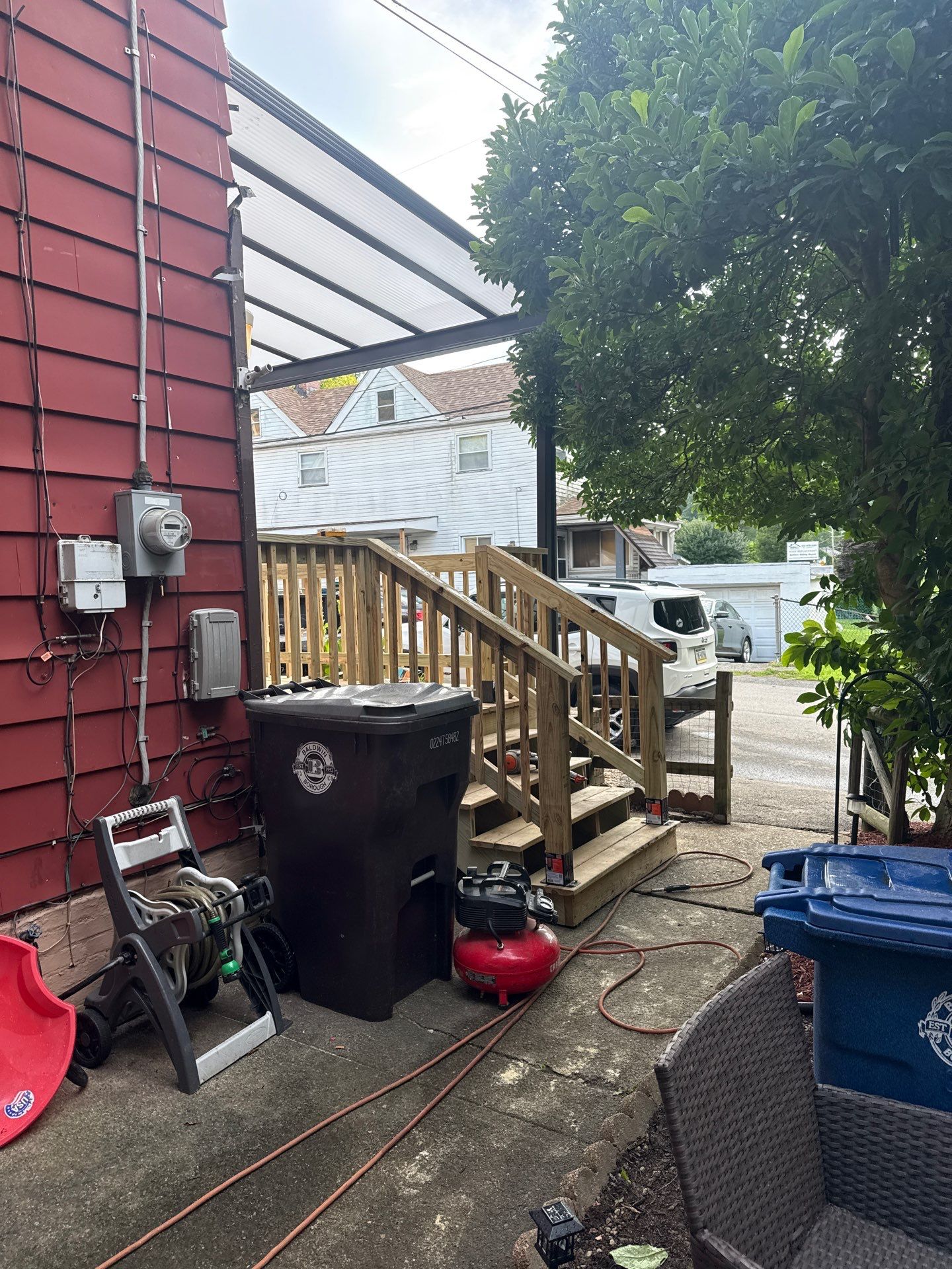 Roof sunspace deck  by Cousins Roofing Siding & Decks