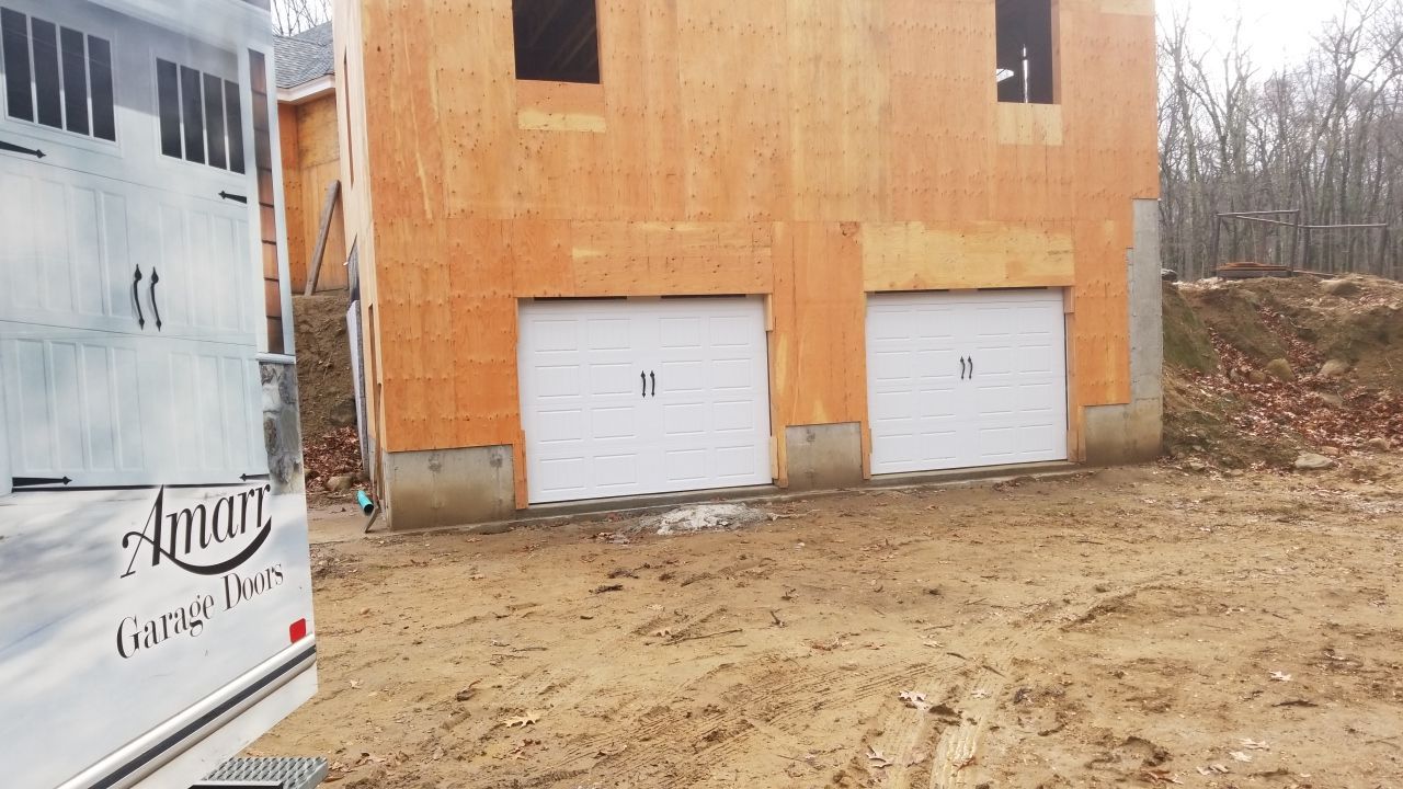 Garage Door Upgrade for Clean Look & Reliable Performance by DiGiorgi Roofing and Siding Inc