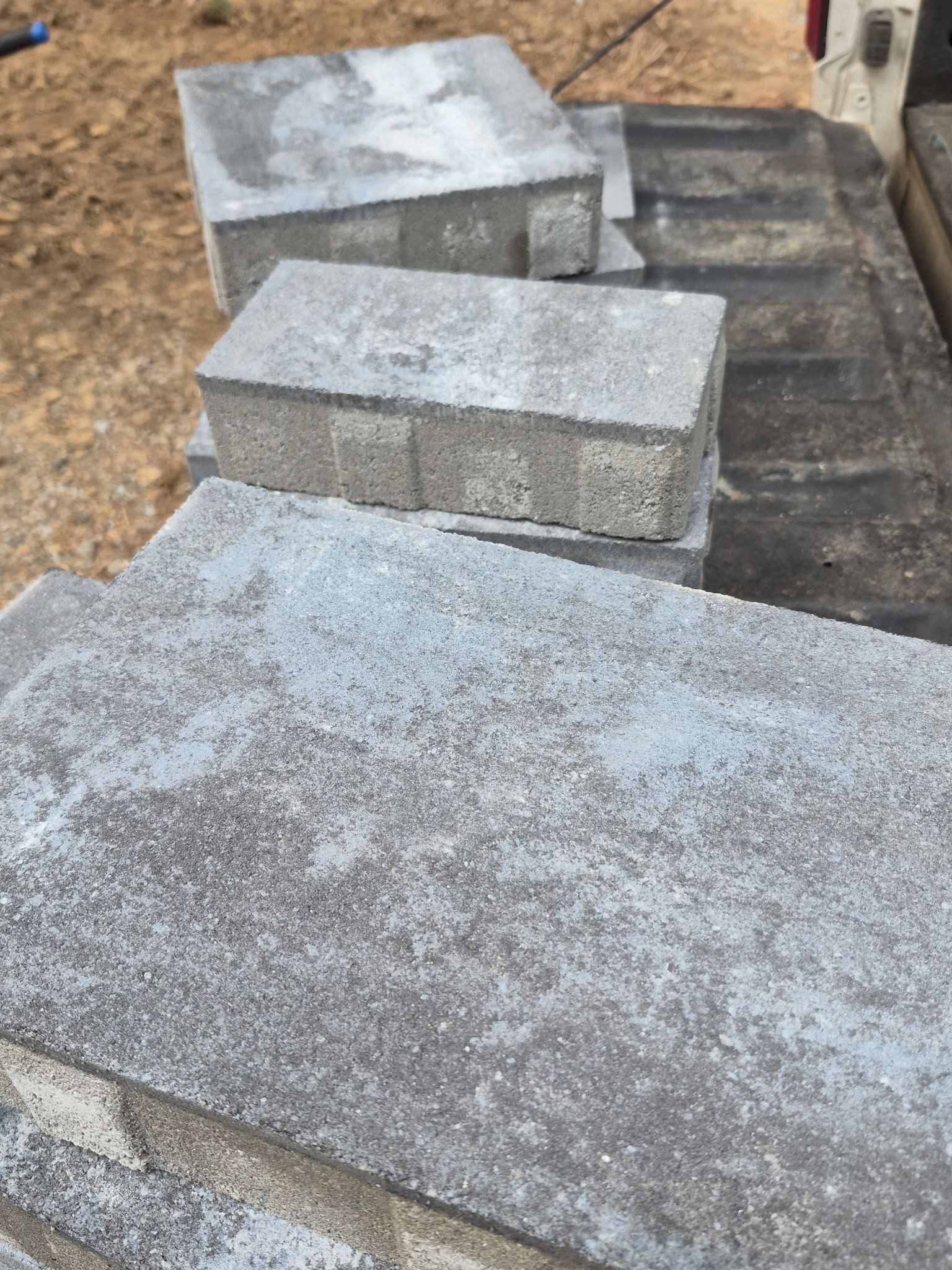 Pittsboro Outdoor Living Transformation – Retaining Wall, Paver Patio & Elevated Deck by Elite Remodeling and Design LLC