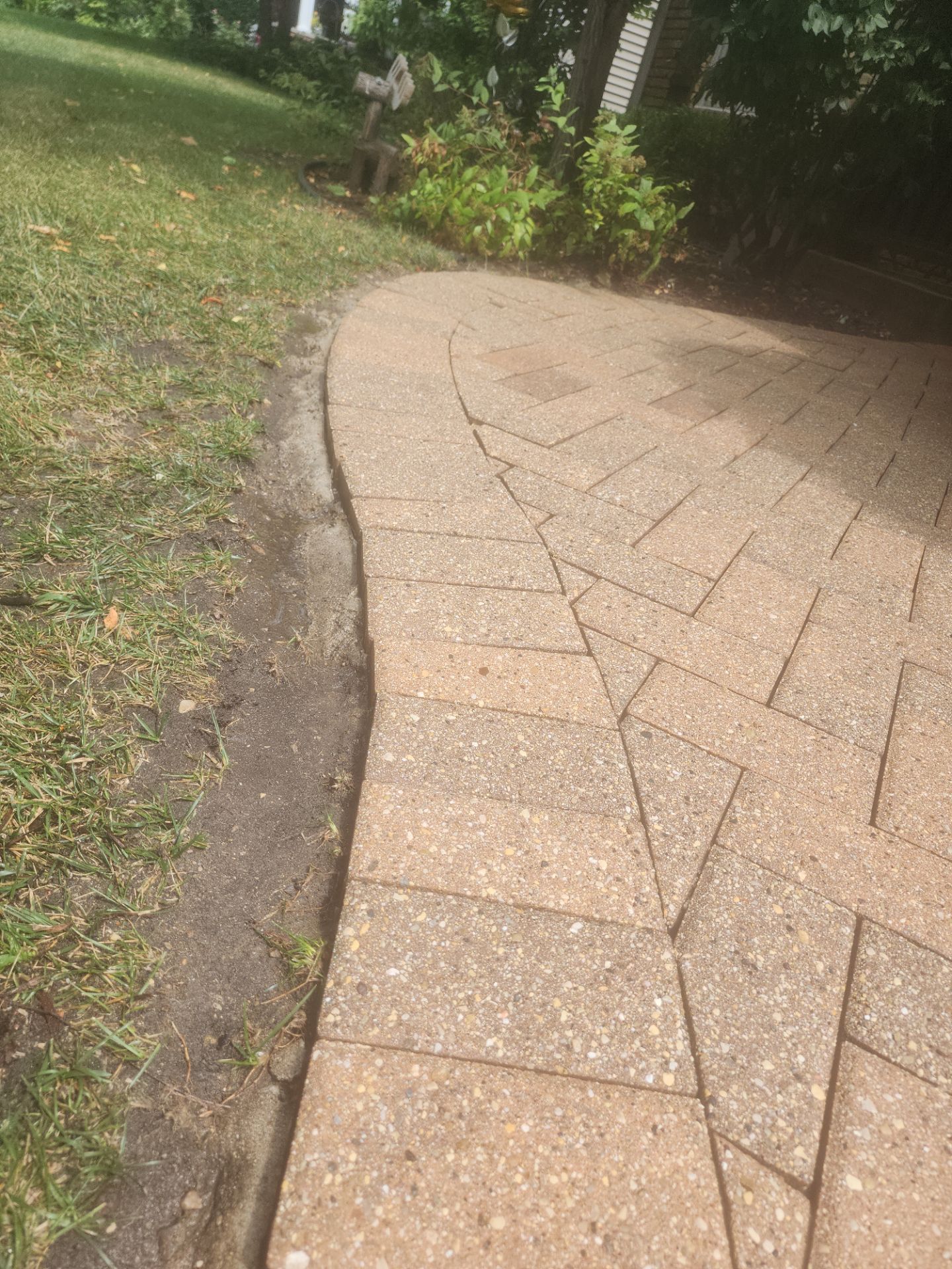 Arlington Heights Brick paver repair, cleaning and sealing by Northern Power Washing LLC.