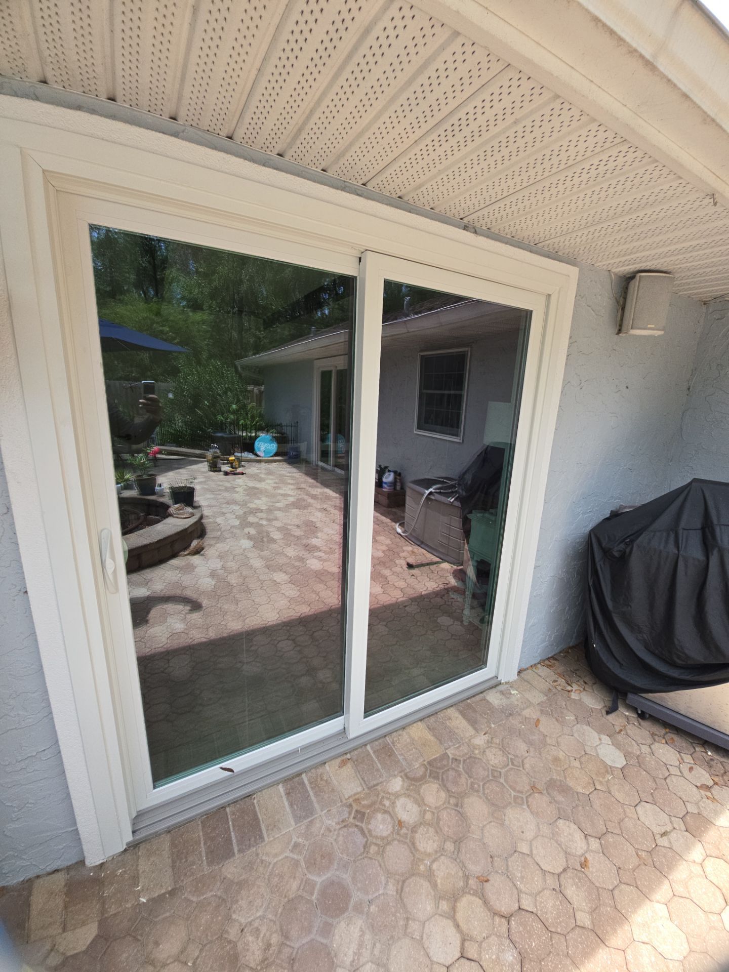 Custom Sliding Glass Door Installation with Integrated Pet Doors in Gainesville by Windows & Doors Store