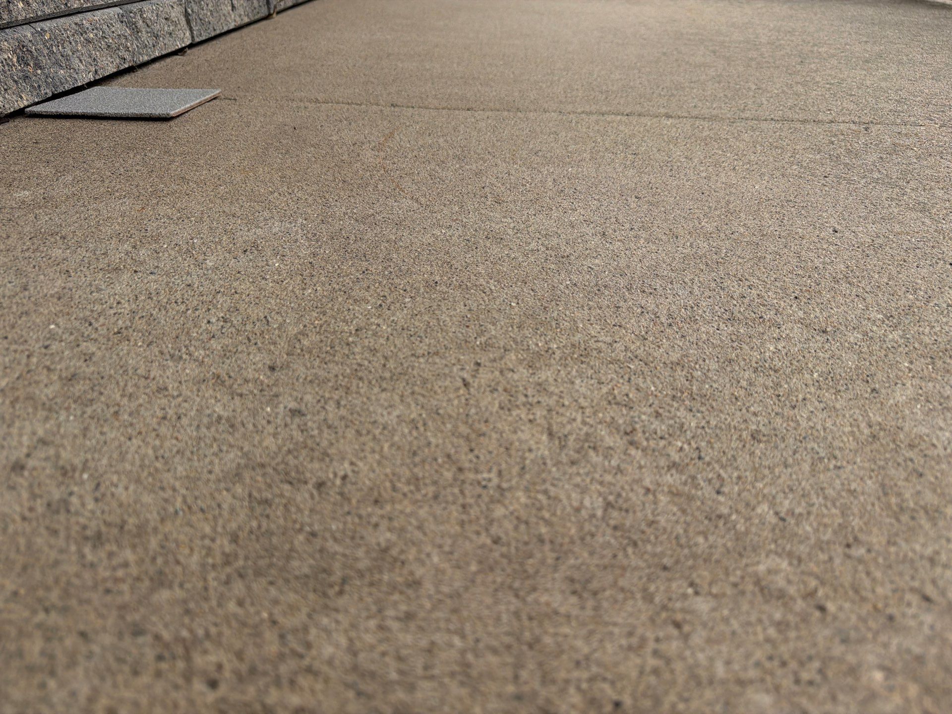 Custom Grey Flake Epoxy Garage Floor Installation in Remsen by Select Painting, Coatings & Garage Cabinets